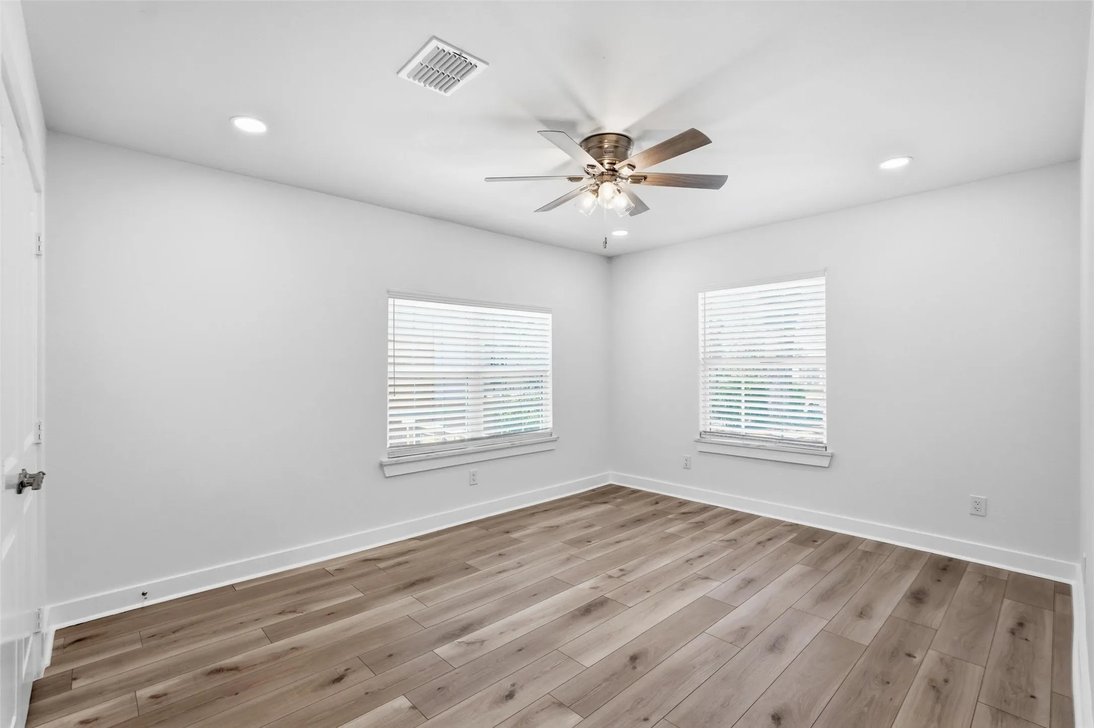 Luxury vinyl plank flooring throughout for a seamless, modern look and easy maintenance.