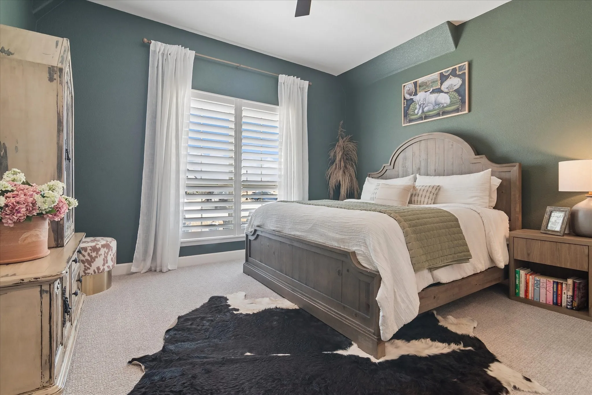 Secondary bedroom is set apart for privacy, front facing, ensuite bathroom. Walk in closet.