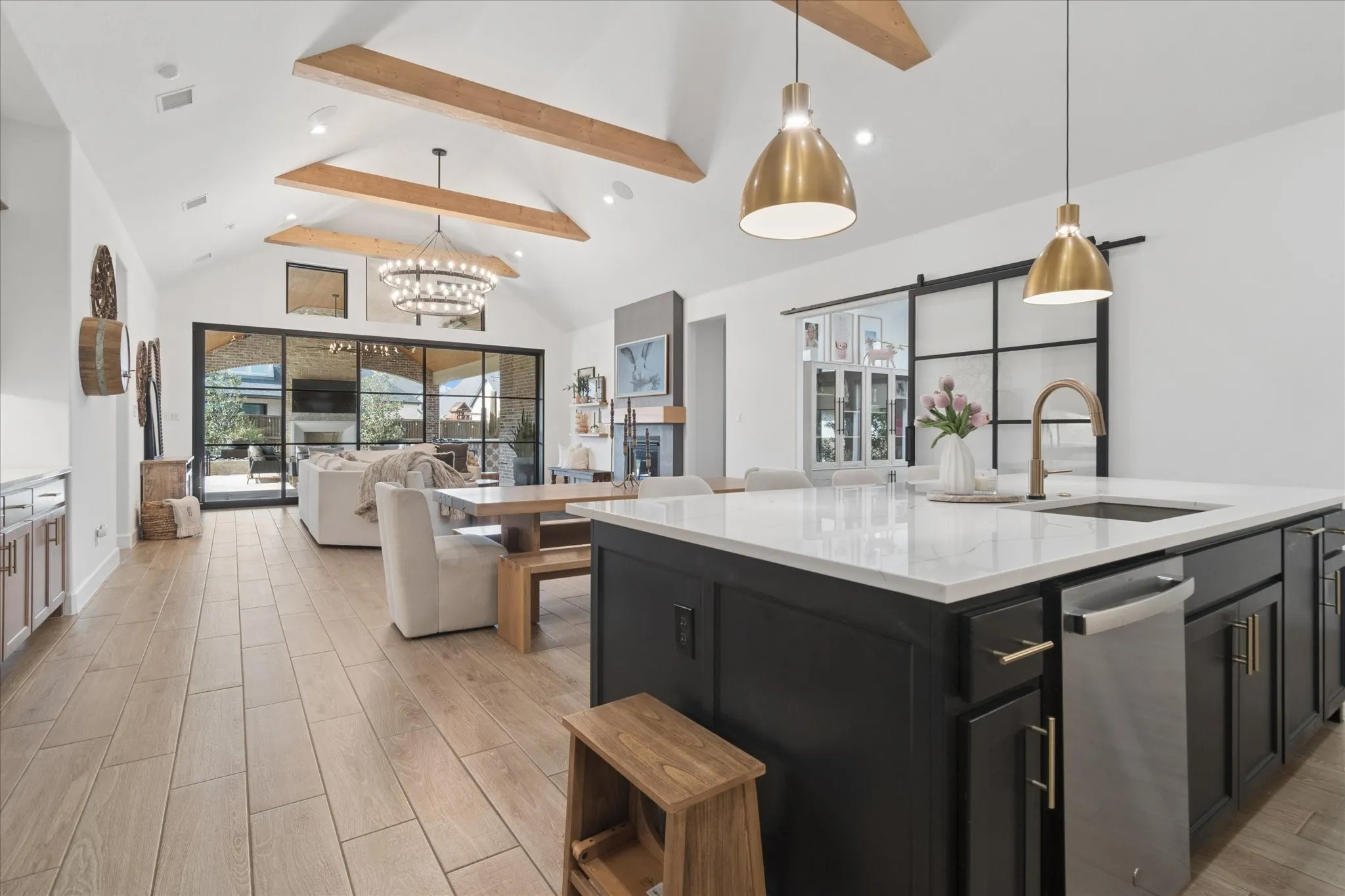 View from kitchen into dining and main living area. Perfect for family or entertaining!