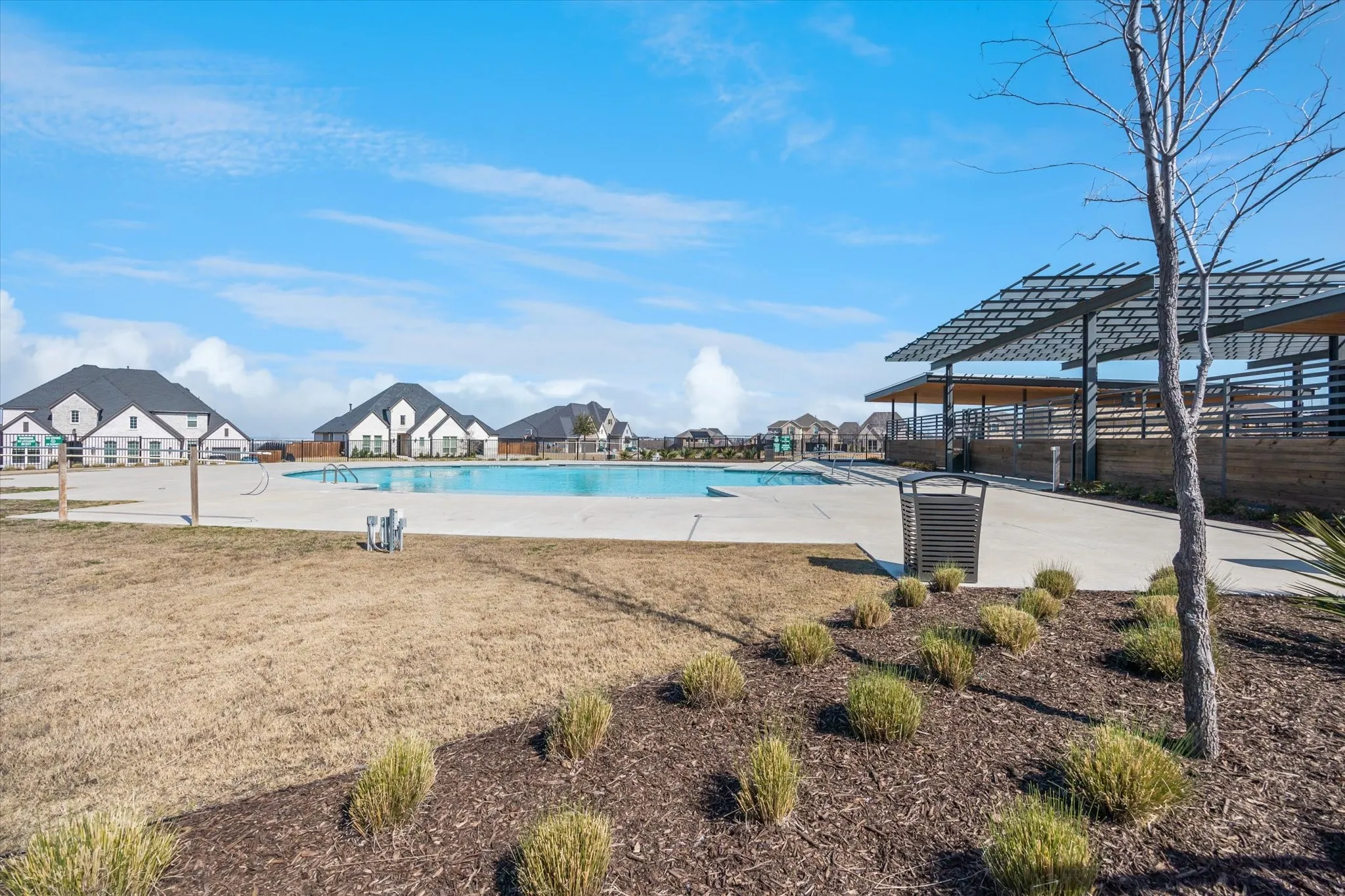 Community pool with arbor surround for relaxing.