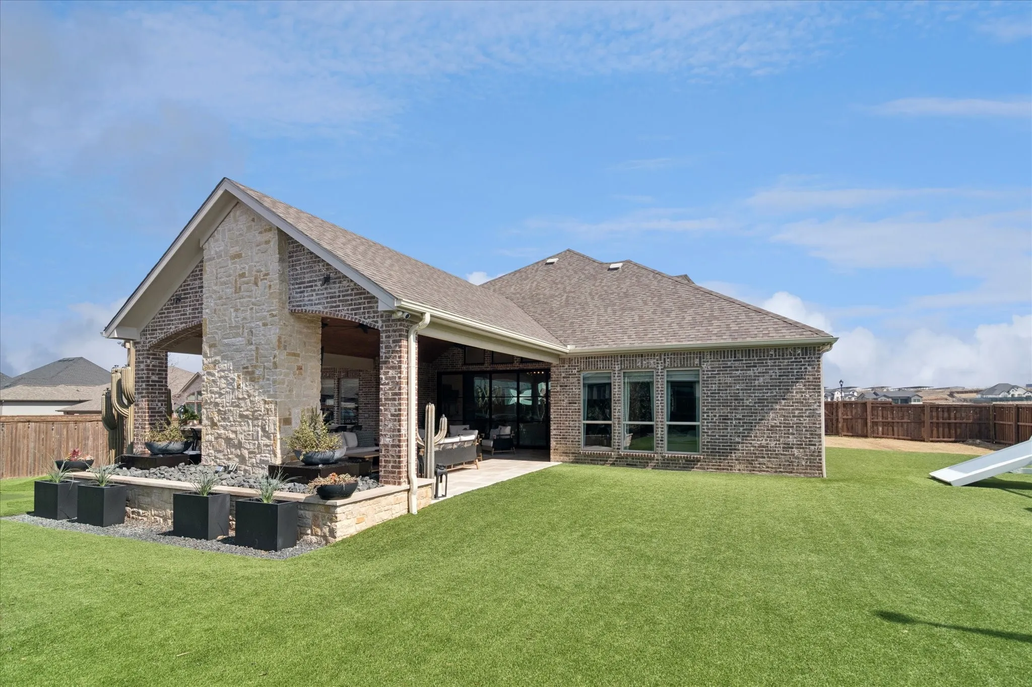 Completely turfed backyard for ease of maintenance and beauty.