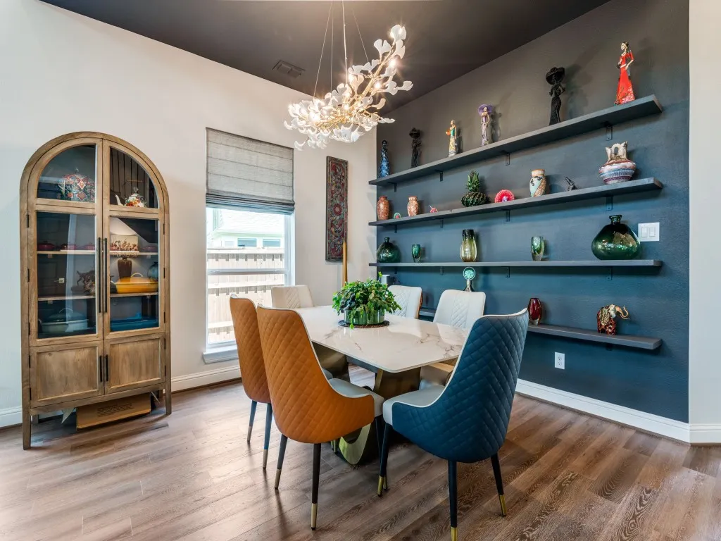 Dining room with a chandelier and wood finished floors