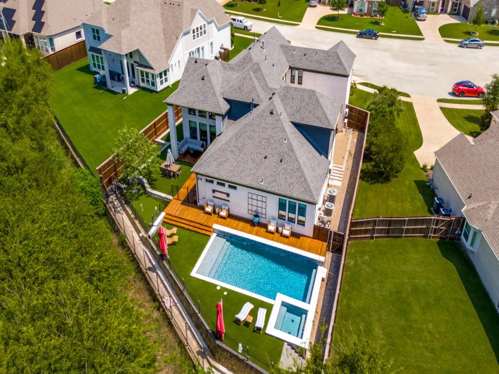 Aerial view of residential area with a pool area