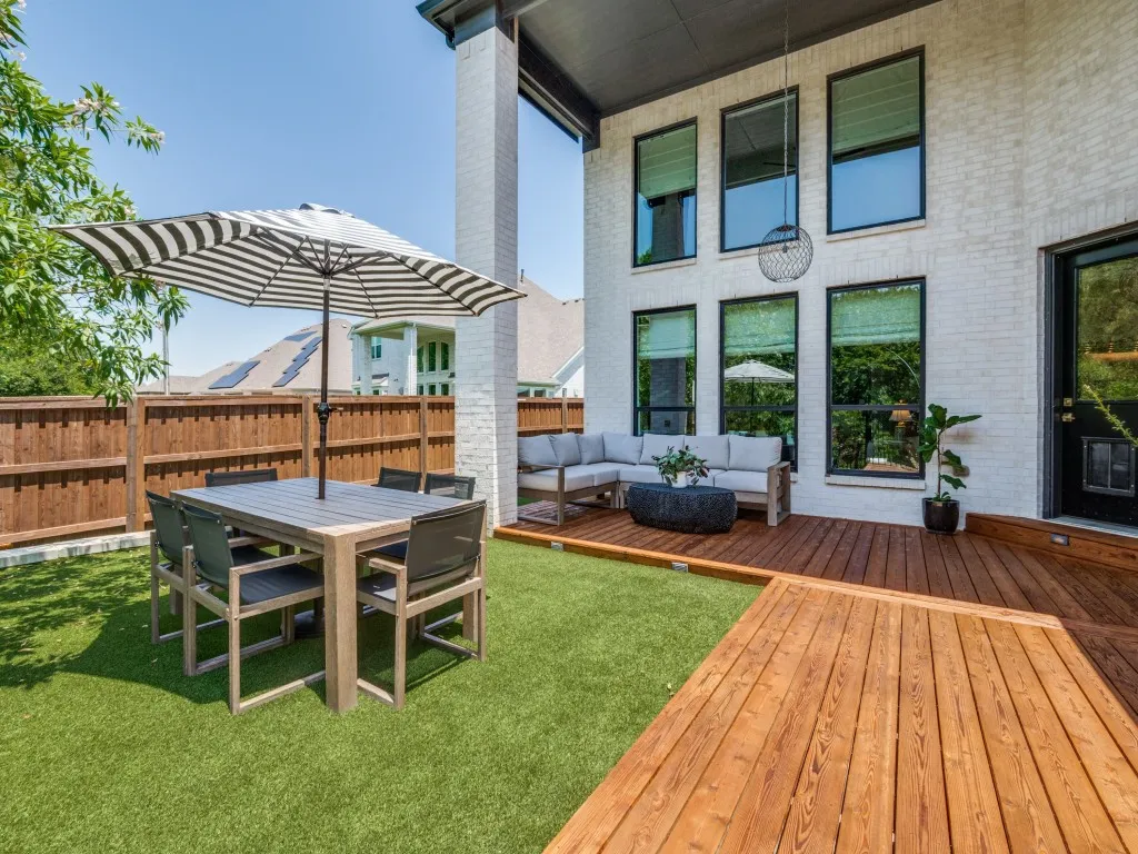 View of yard with an outdoor hangout area and a deck