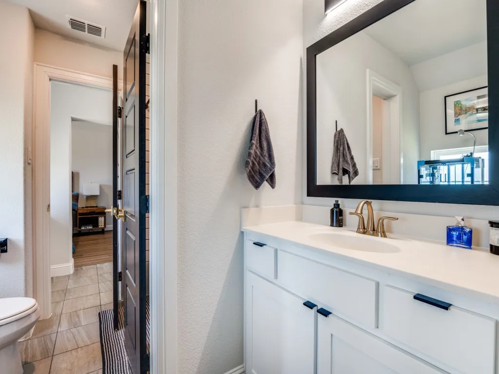Bathroom with toilet and vanity