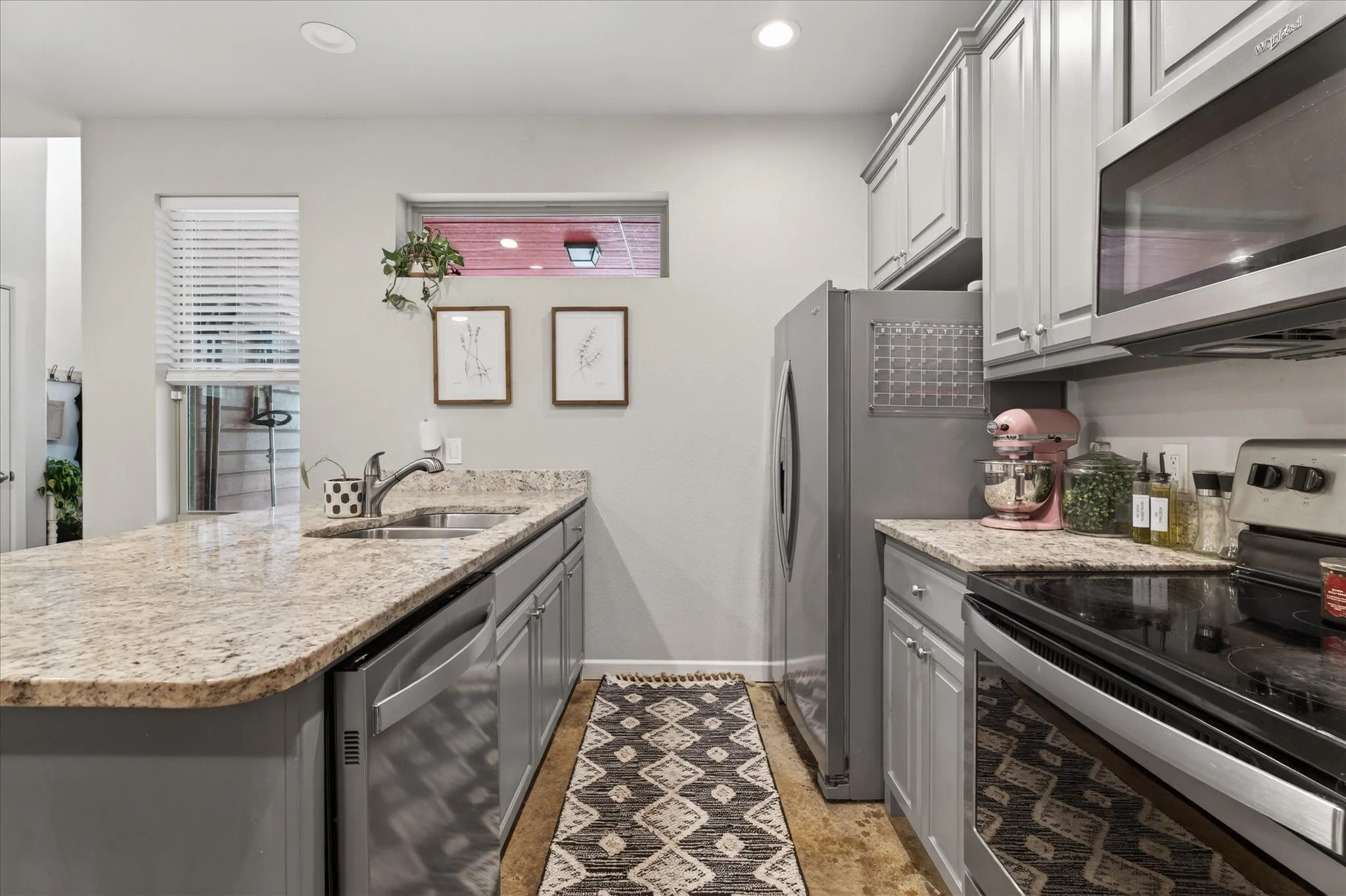 Kitchen with stainless steel and granite