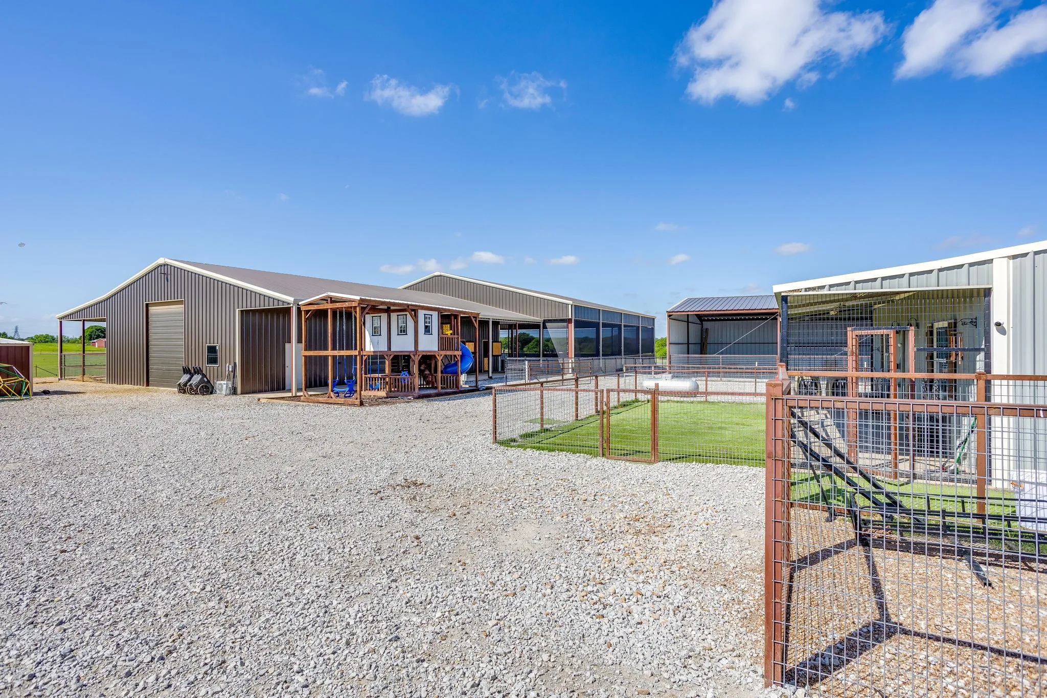parking and view to show barn and covered arena