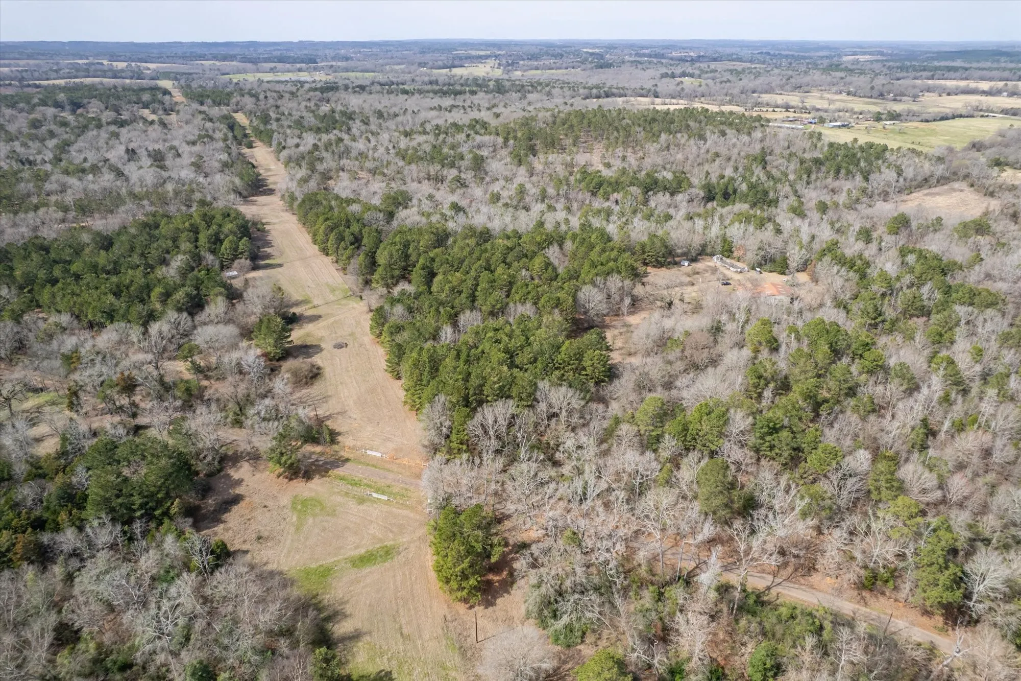View of rural area with a heavily wooded area