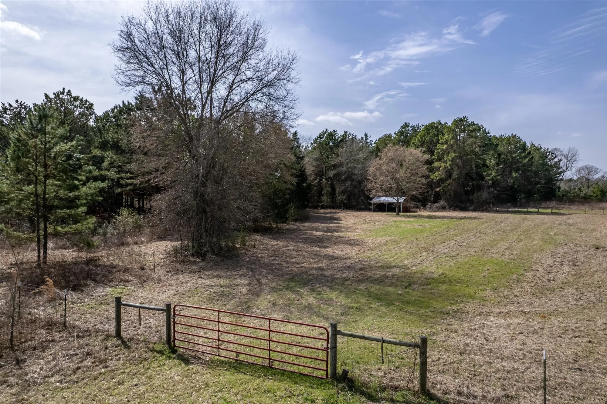 View of yard with a gate and a view of countryside