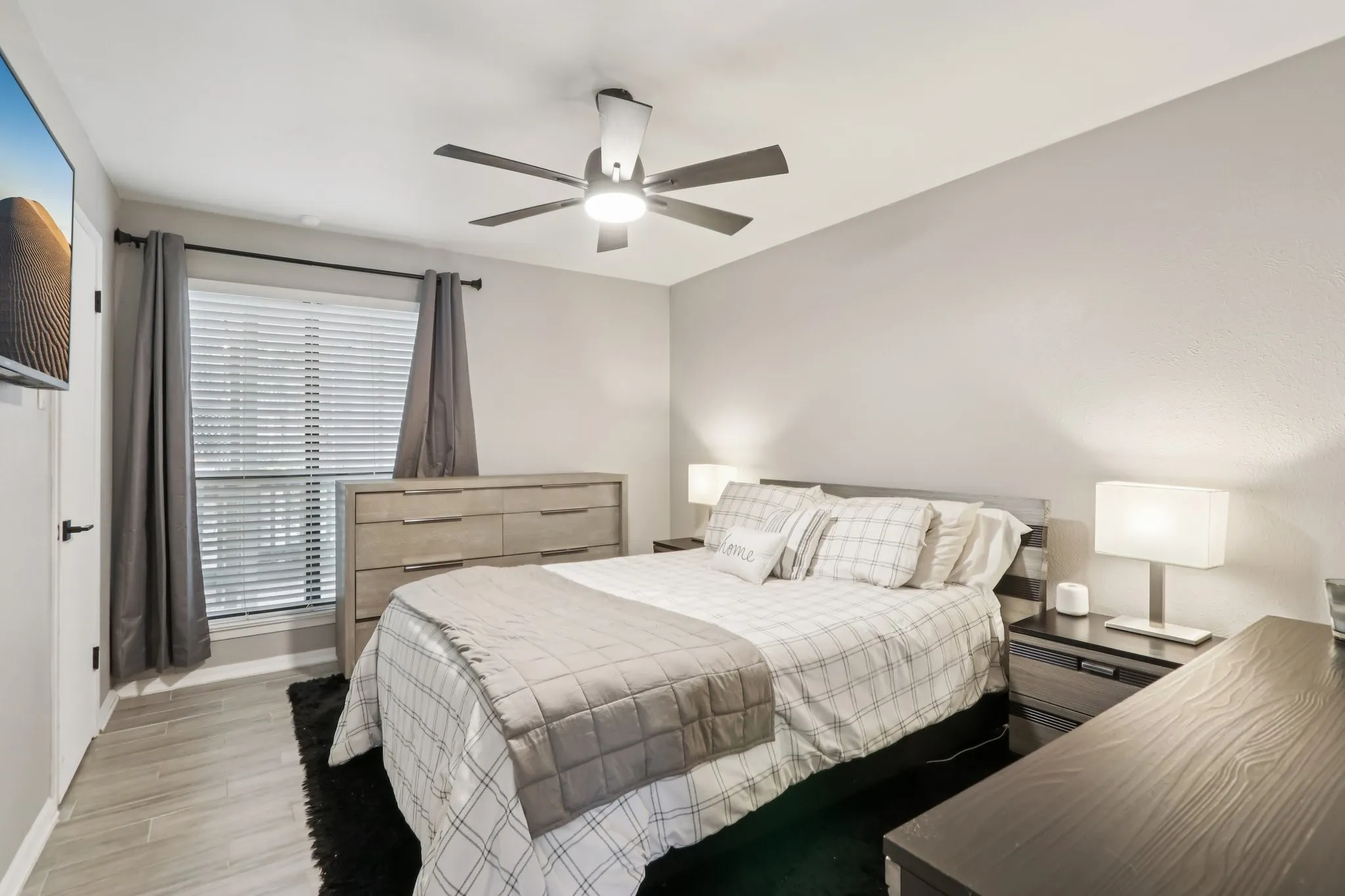 Bedroom featuring light wood-style floors and ceiling fan