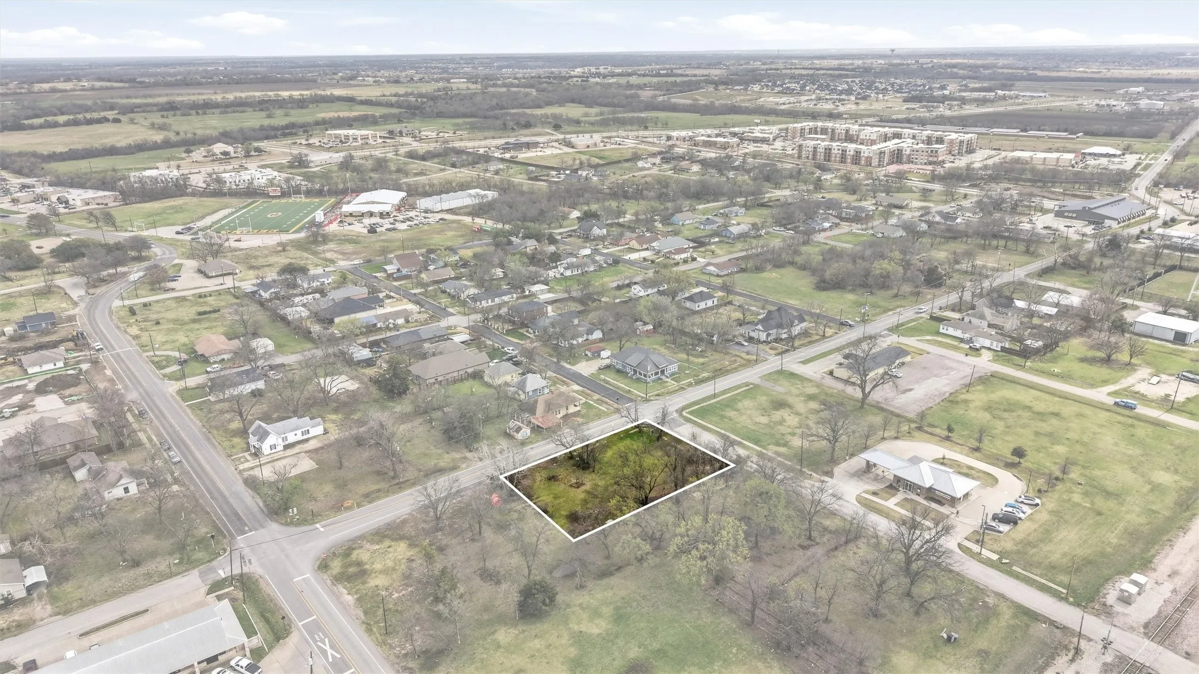 Prominent corner location with strong accessibility and visibility.