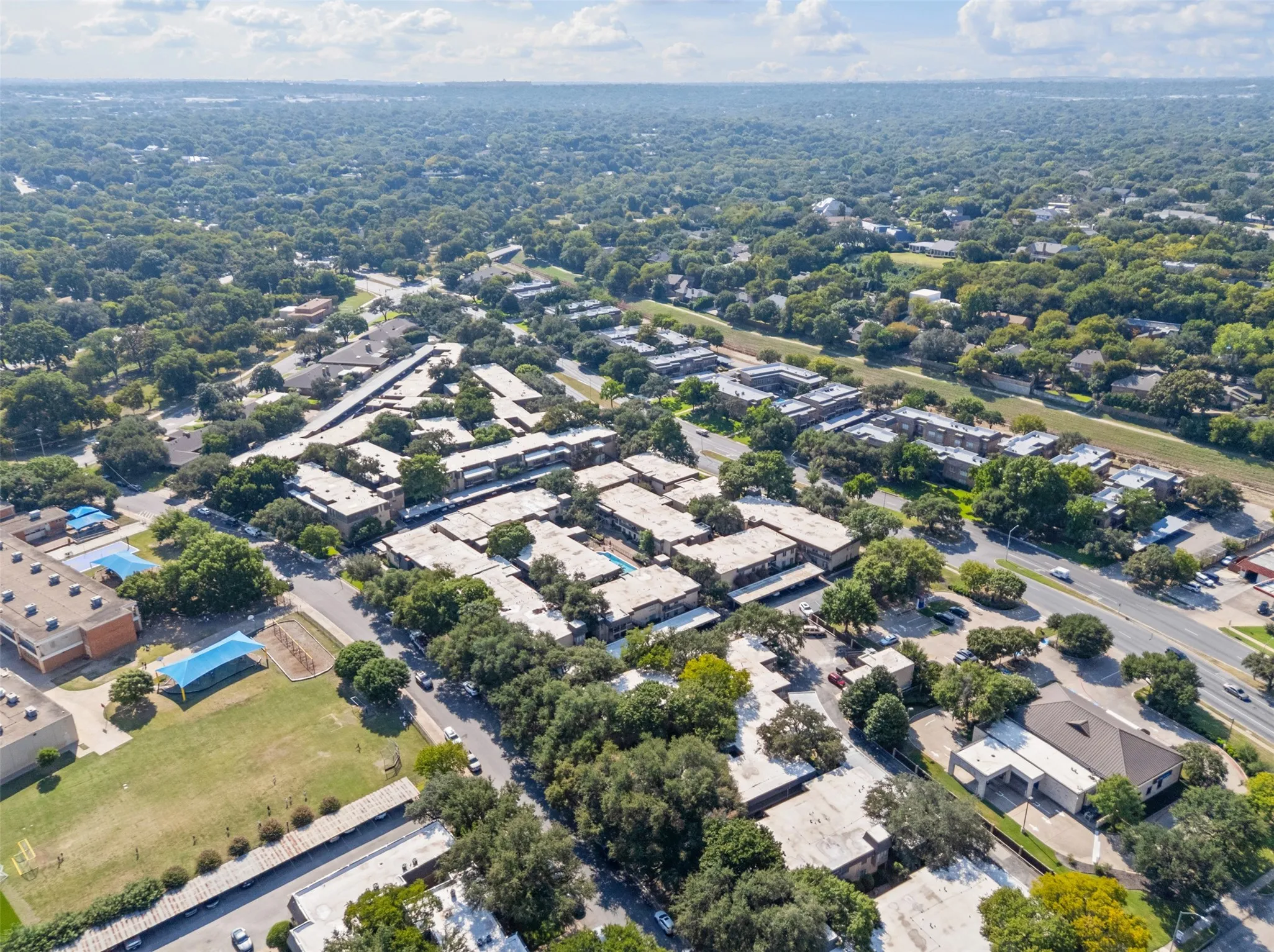 Aerial view of condominium complex and Bellaire Drive South.