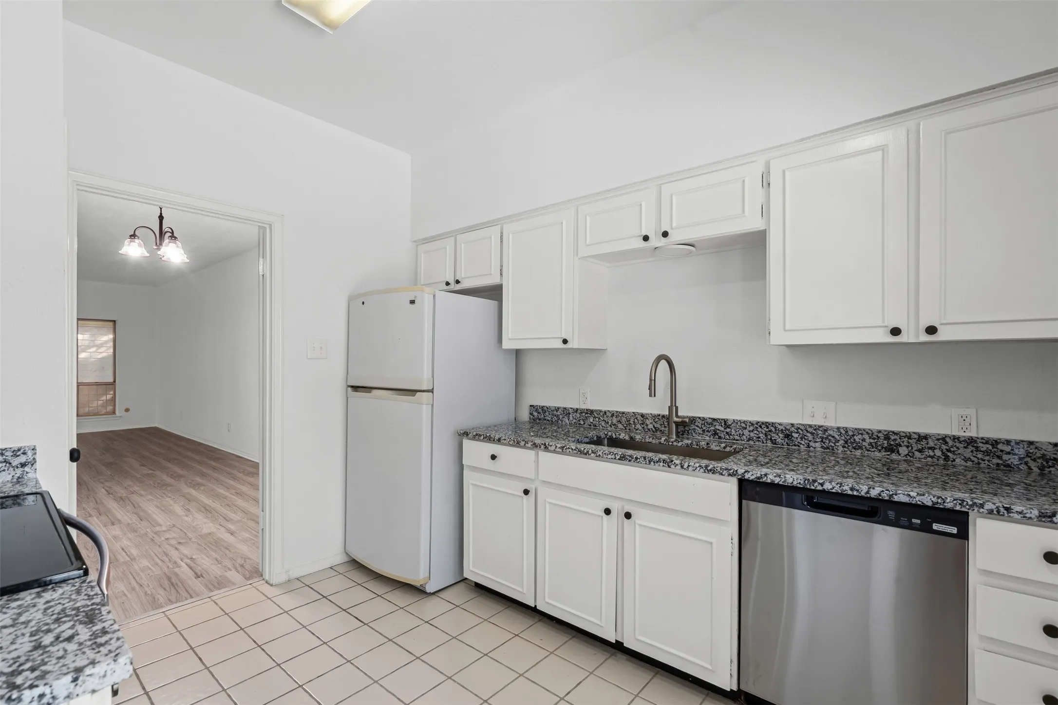 Kitchen with granite countertops.