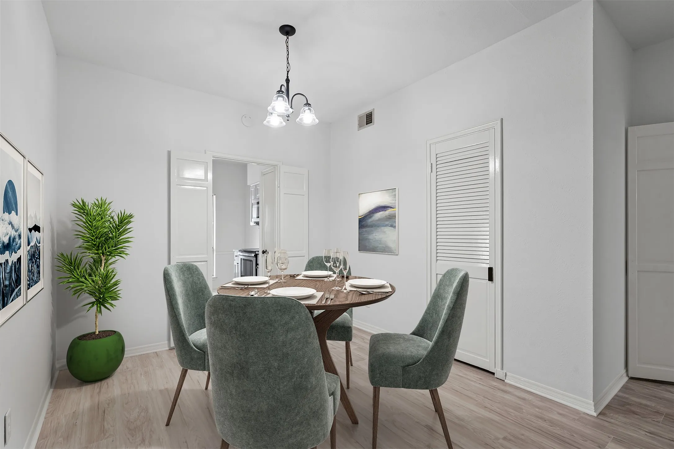 Virtually staged dining room with storage closet