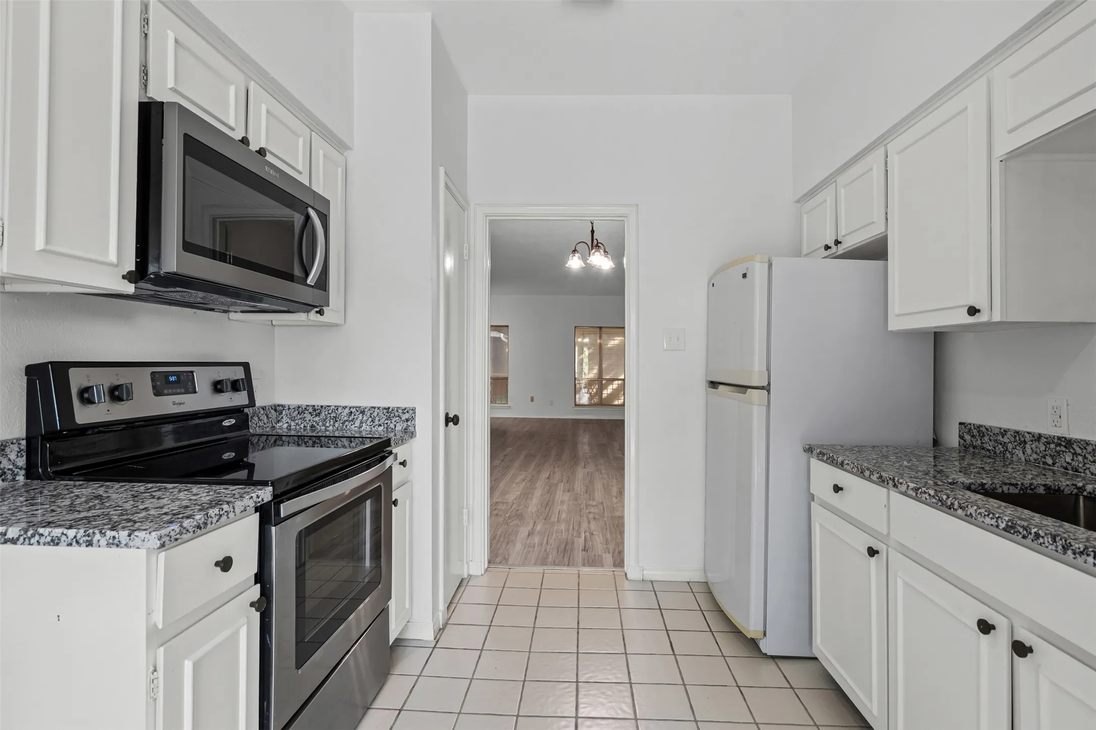 Kitchen with new granite countertops.