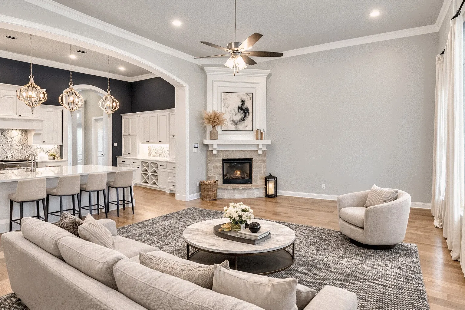 Living room with a ceiling fan, light wood-style flooring, a stone fireplace, crown molding.  AI staged photo