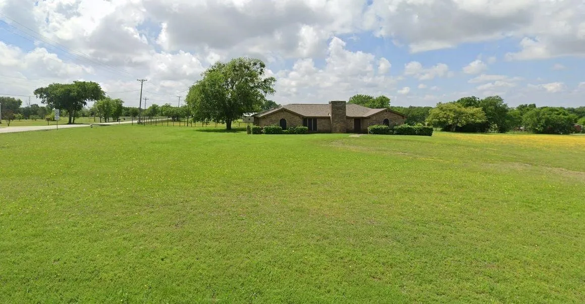 View of green lawn featuring a view of countryside