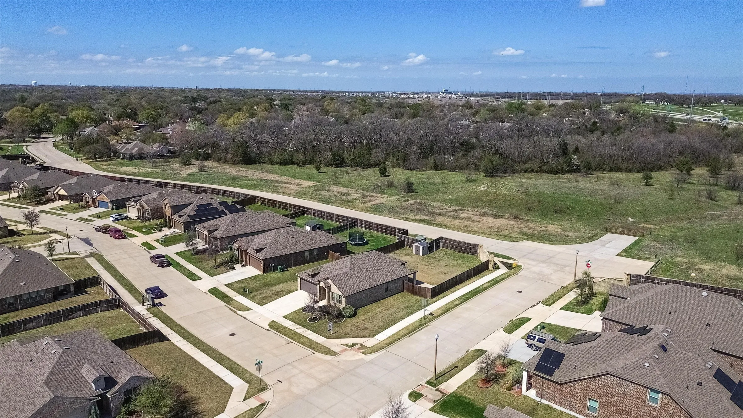 The property backs up to a large tract of undeveloped land.  There are not any neighbors looking into your back yard.