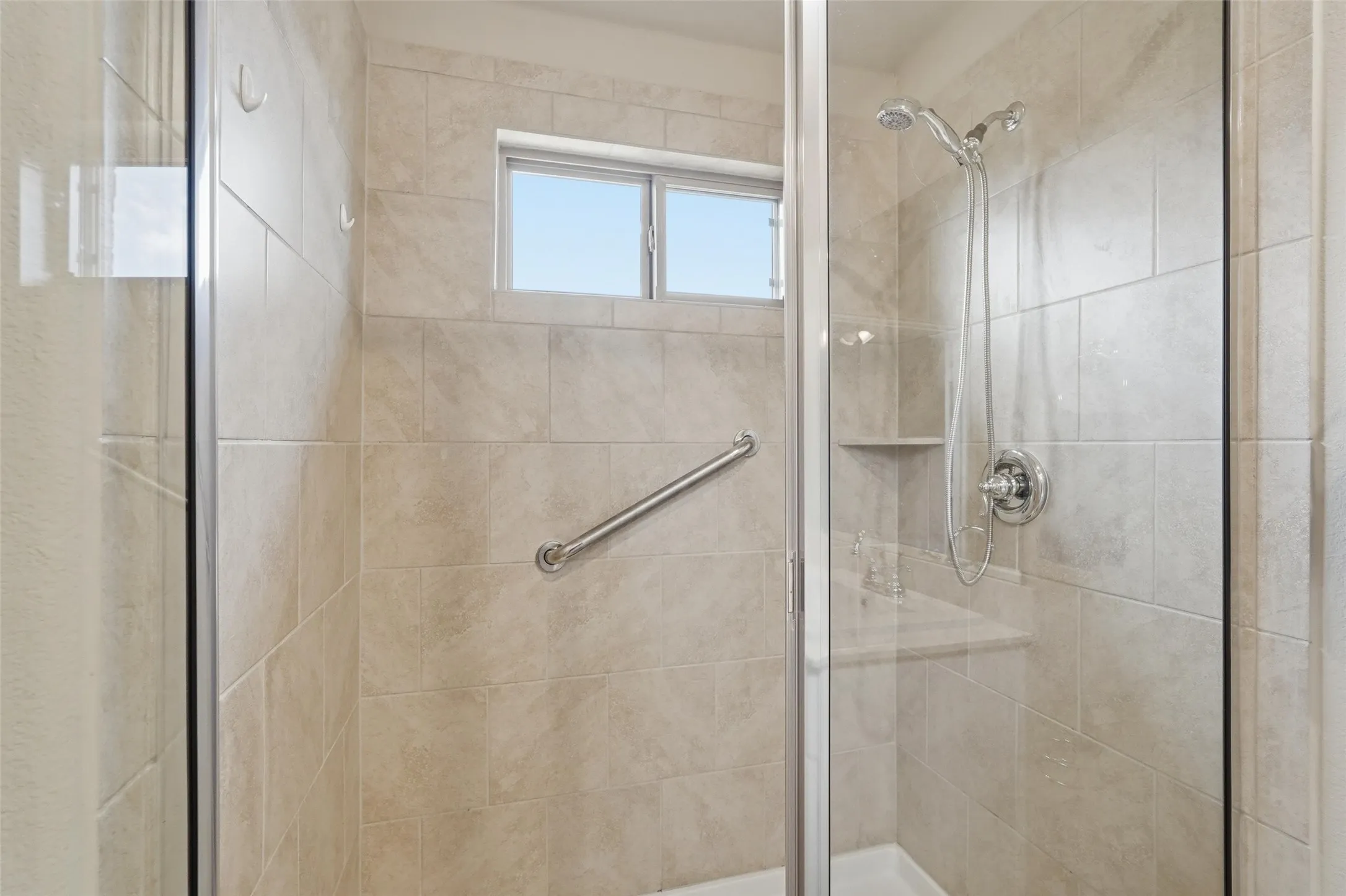 Large primary bath with walk-in shower.