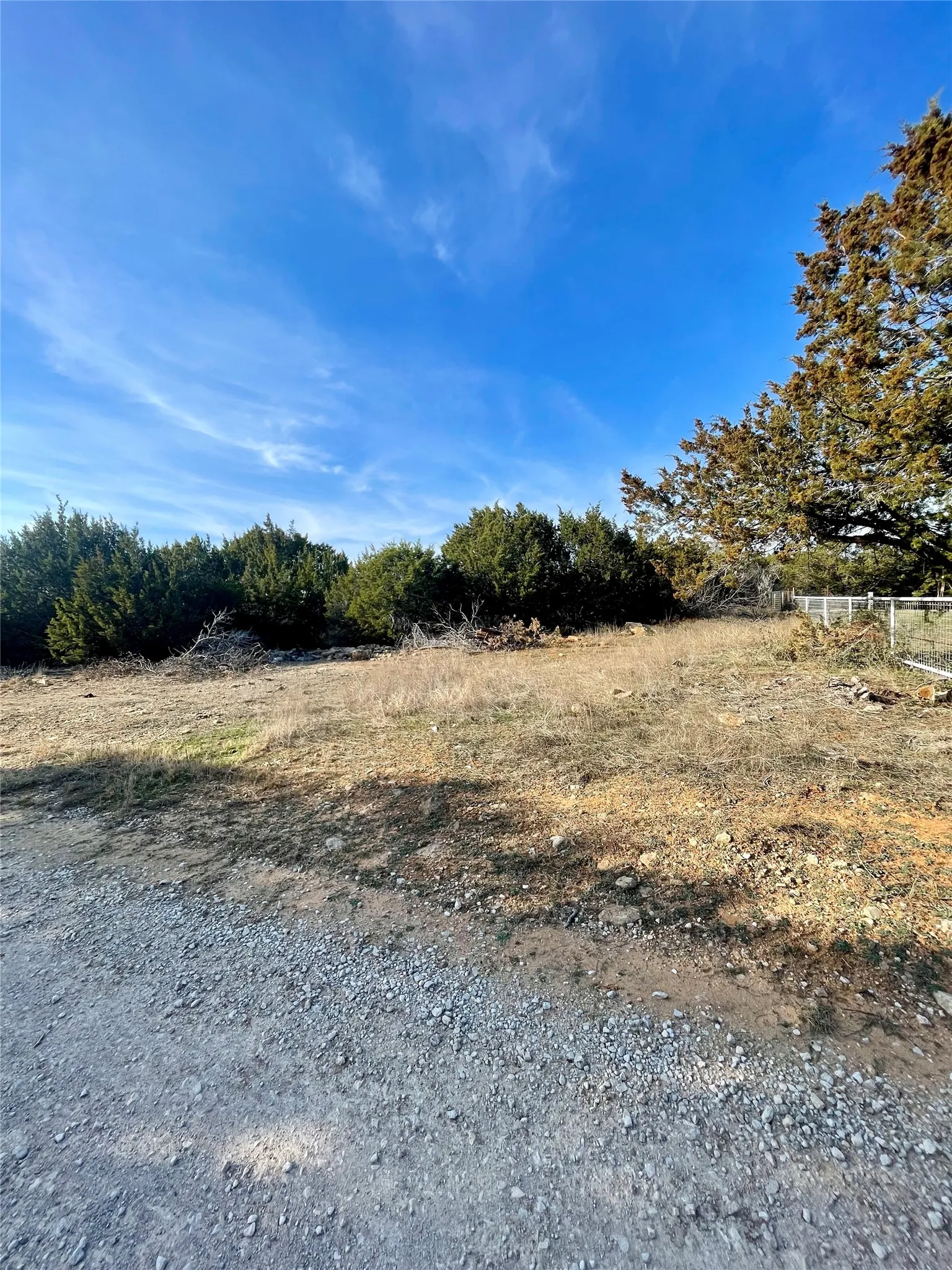 View from Arrowhead Trail - fence in photo is neighboring lot