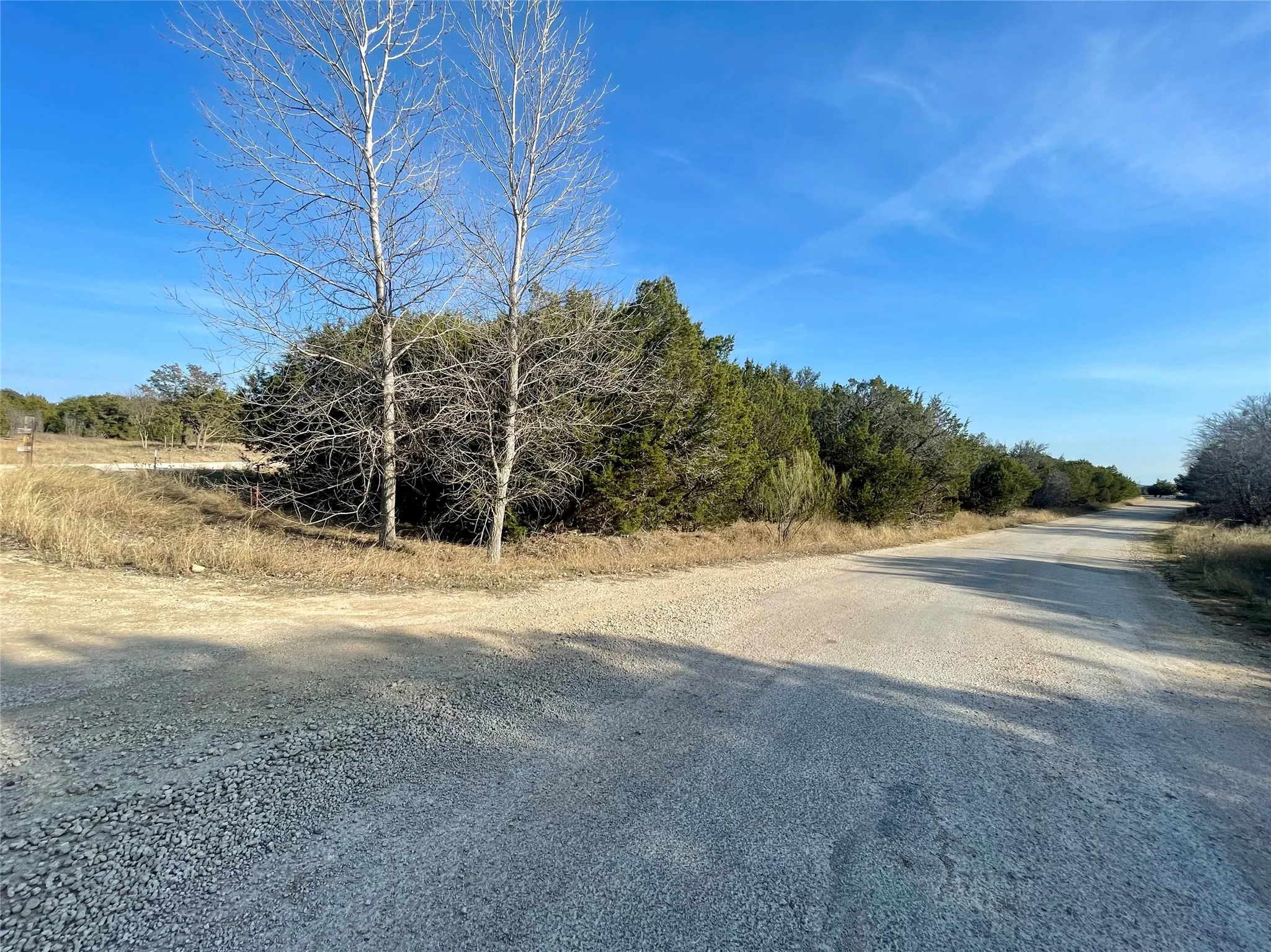 Corner of lot where Lakeshore Lane and Arrowhead Road meet