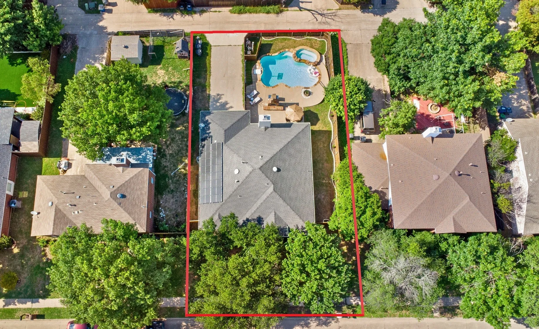 Aerial view of residential area with a pool area