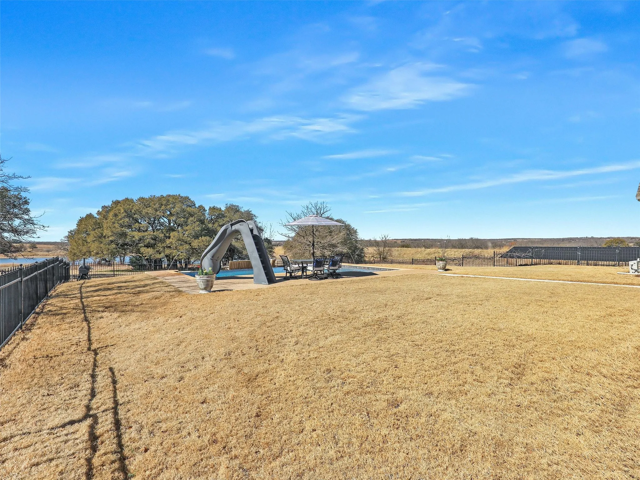 Side Yard with View of Community Lake