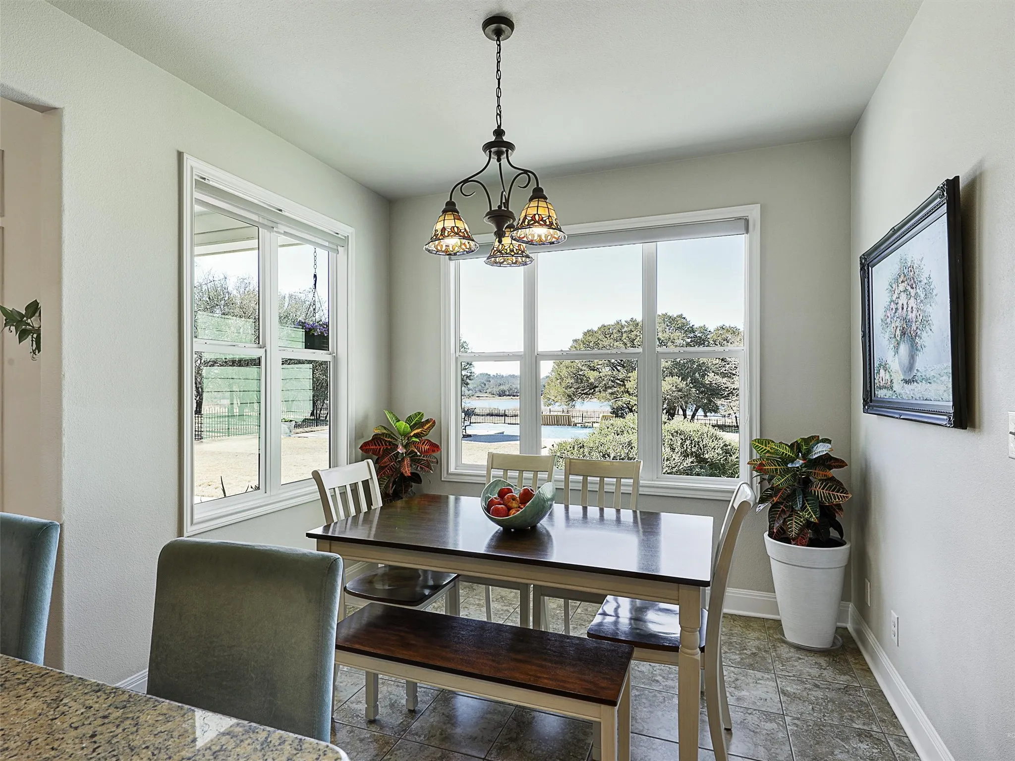 Breakfast Area with Picture Windows with a View to the Pool, Community Pond and the Wide Open Spaces
