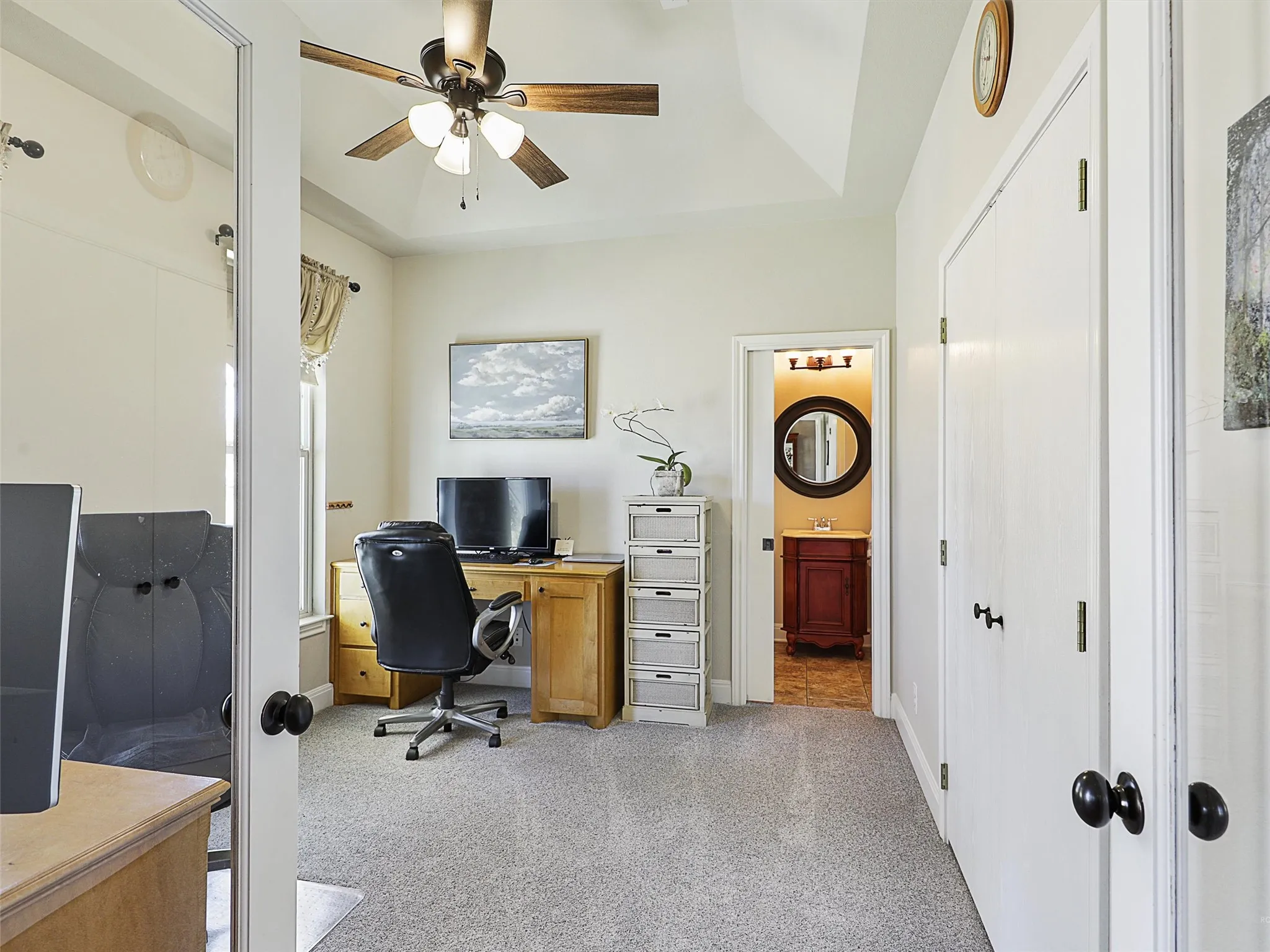 Dedicated Office with 2 Built In Desks and Easy Access to the Half Bath