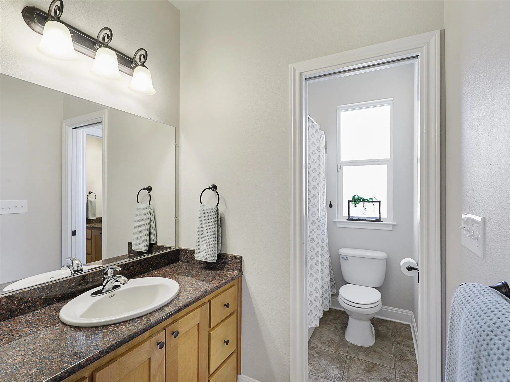 Jack and Jill Bathroom in between the Secondary Bedrooms #2 and #3