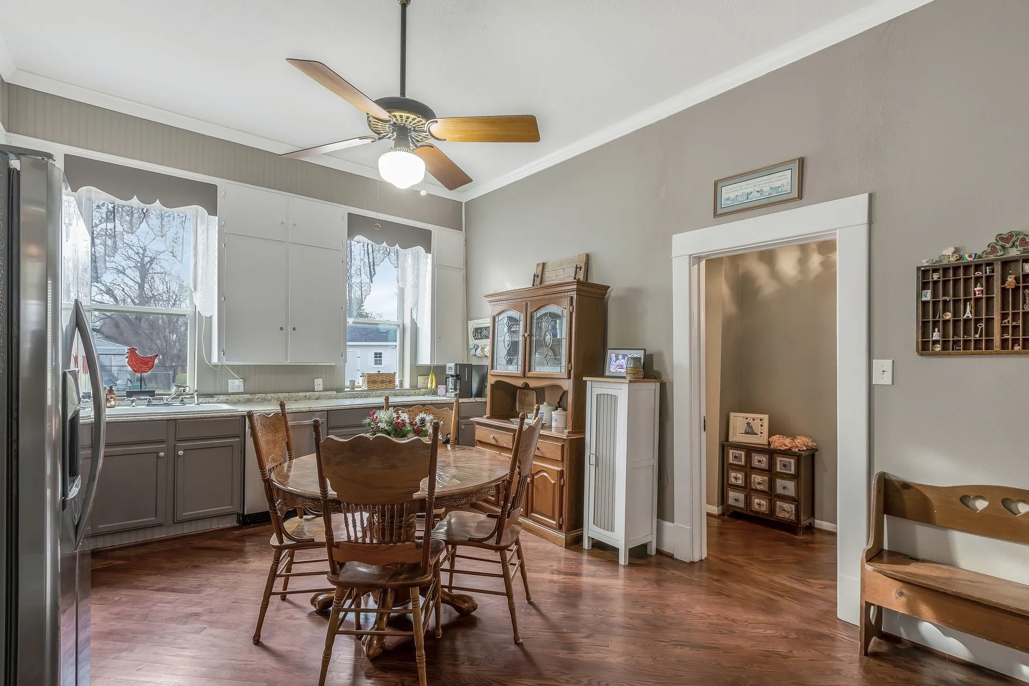 Adorable eat in kitchen with tons of natural light overlooking spacious backyard!