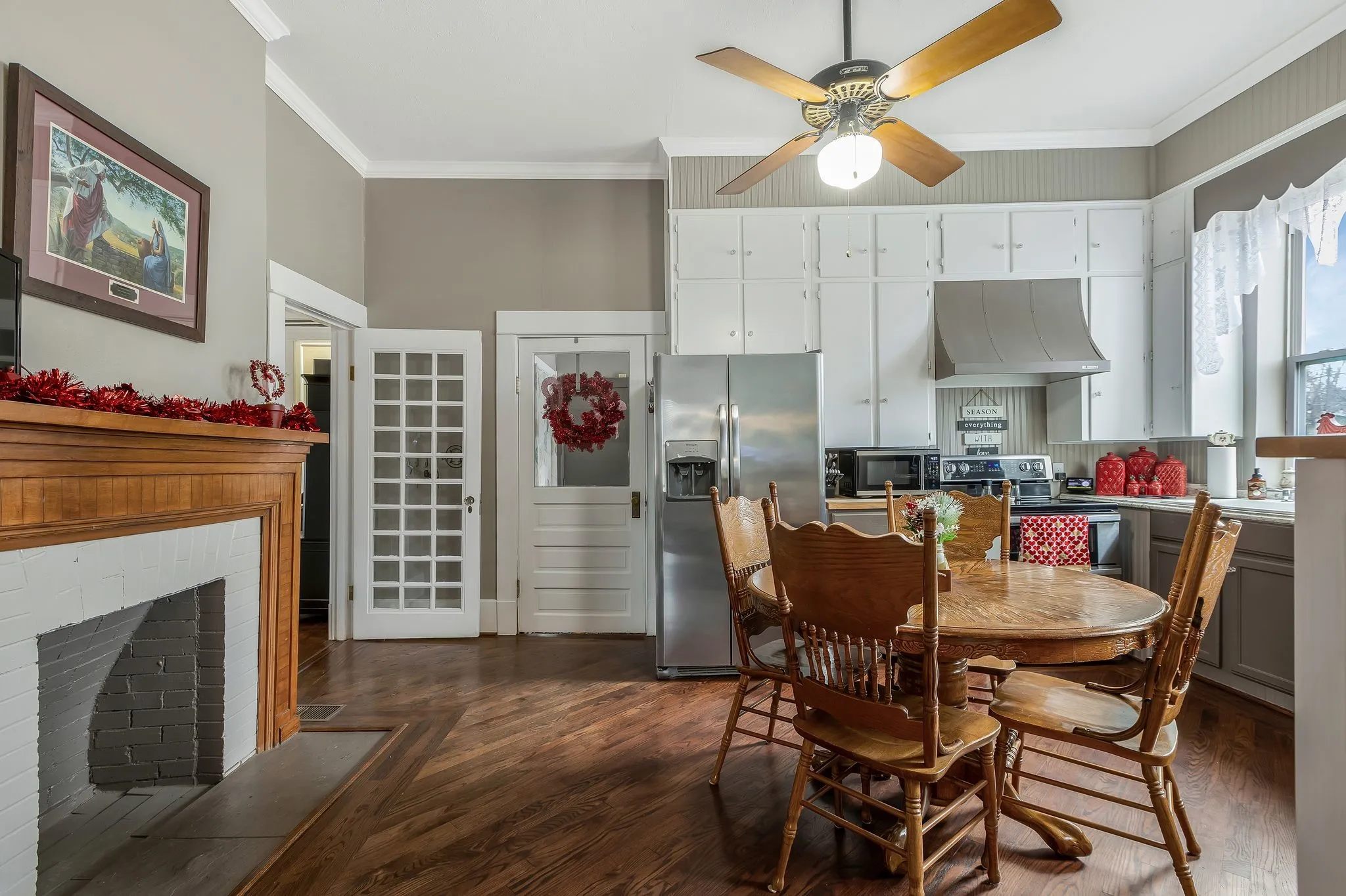 Why yes! there IS  fireplace in the kitchen! Currently inoperable but buyer is welcome to bring back to original condition or get creative with modern heating or decorative update.
