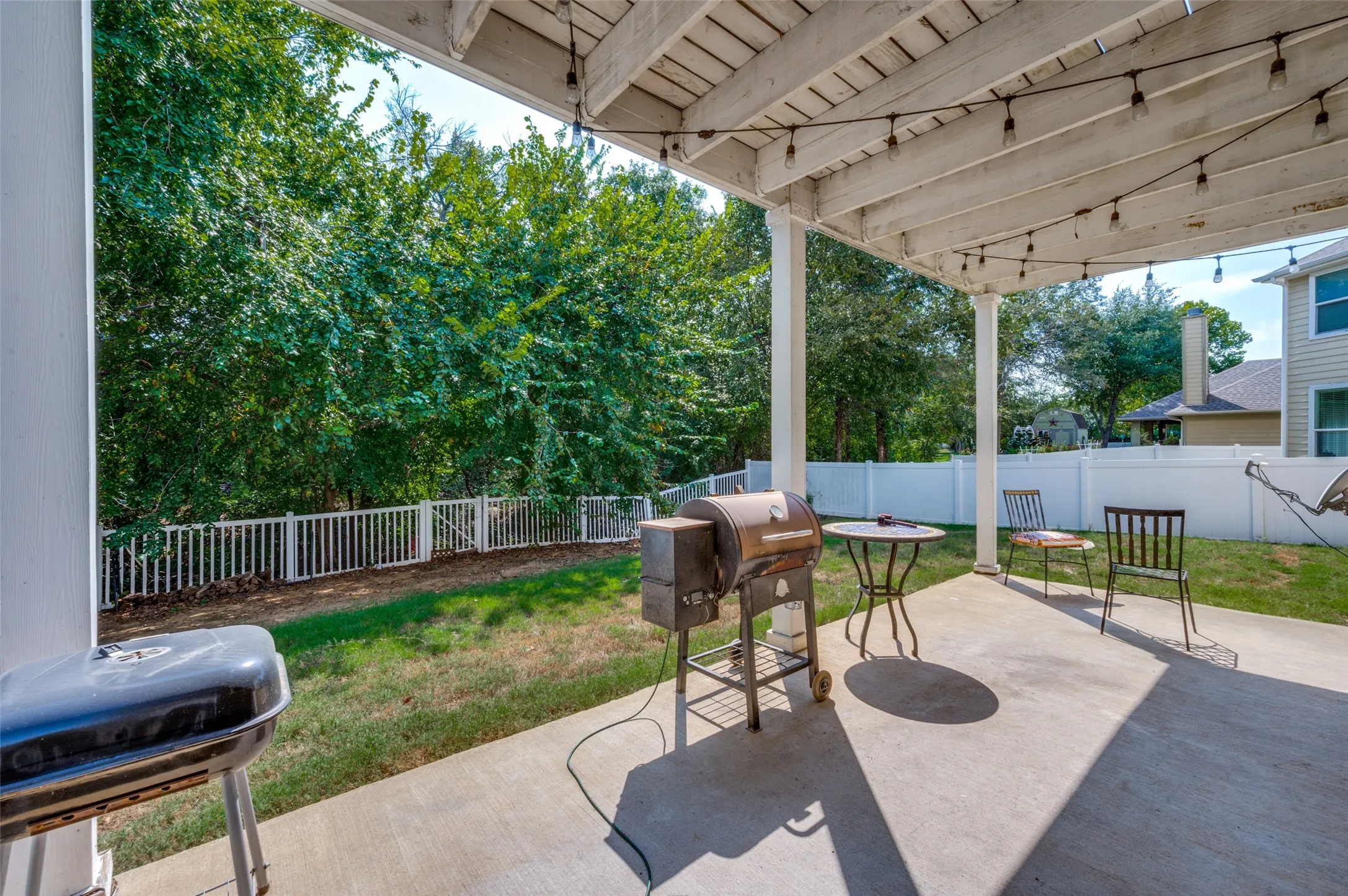 Covered back patio conveniently located off of the kitchen and dining area.