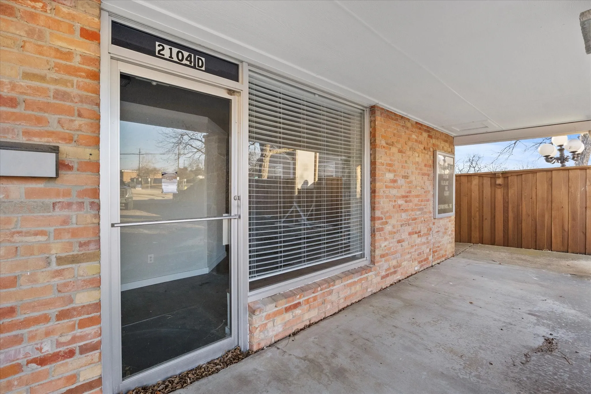 Covered porch welcomes your arrival to Suite D!