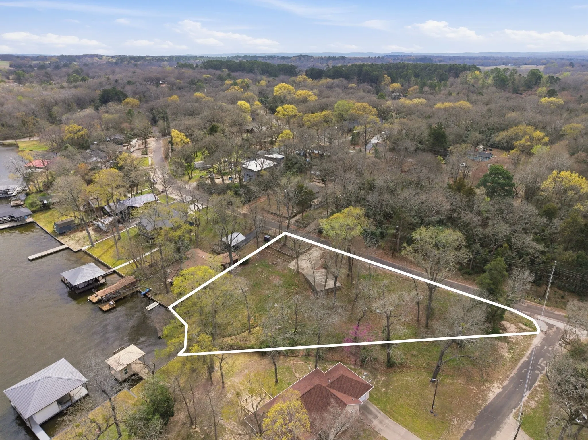 Plenty of room to build the lake house of your dreams here!