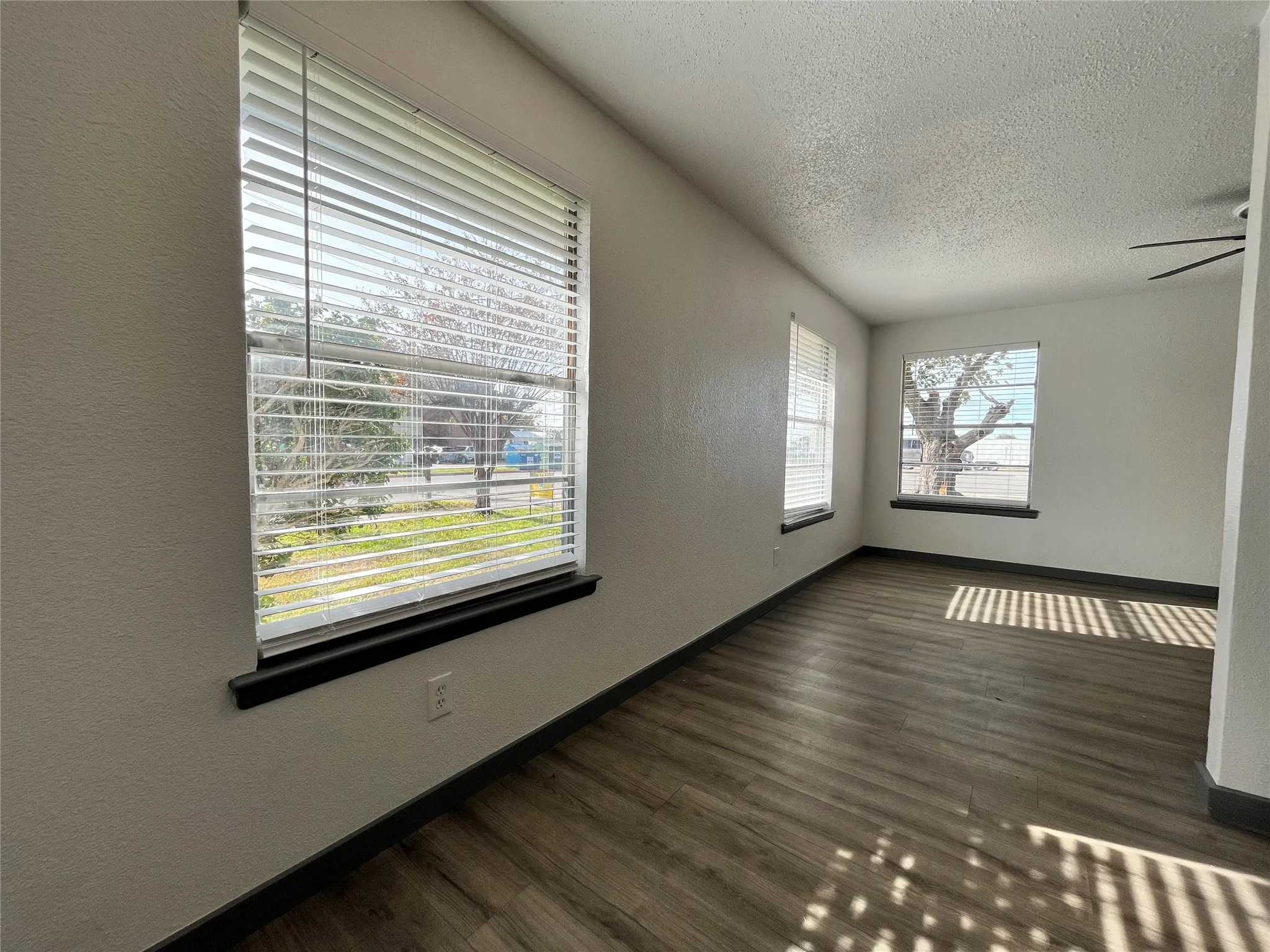 This is another view of the charming dining area. Notice the open floor plan that opens into the living area.