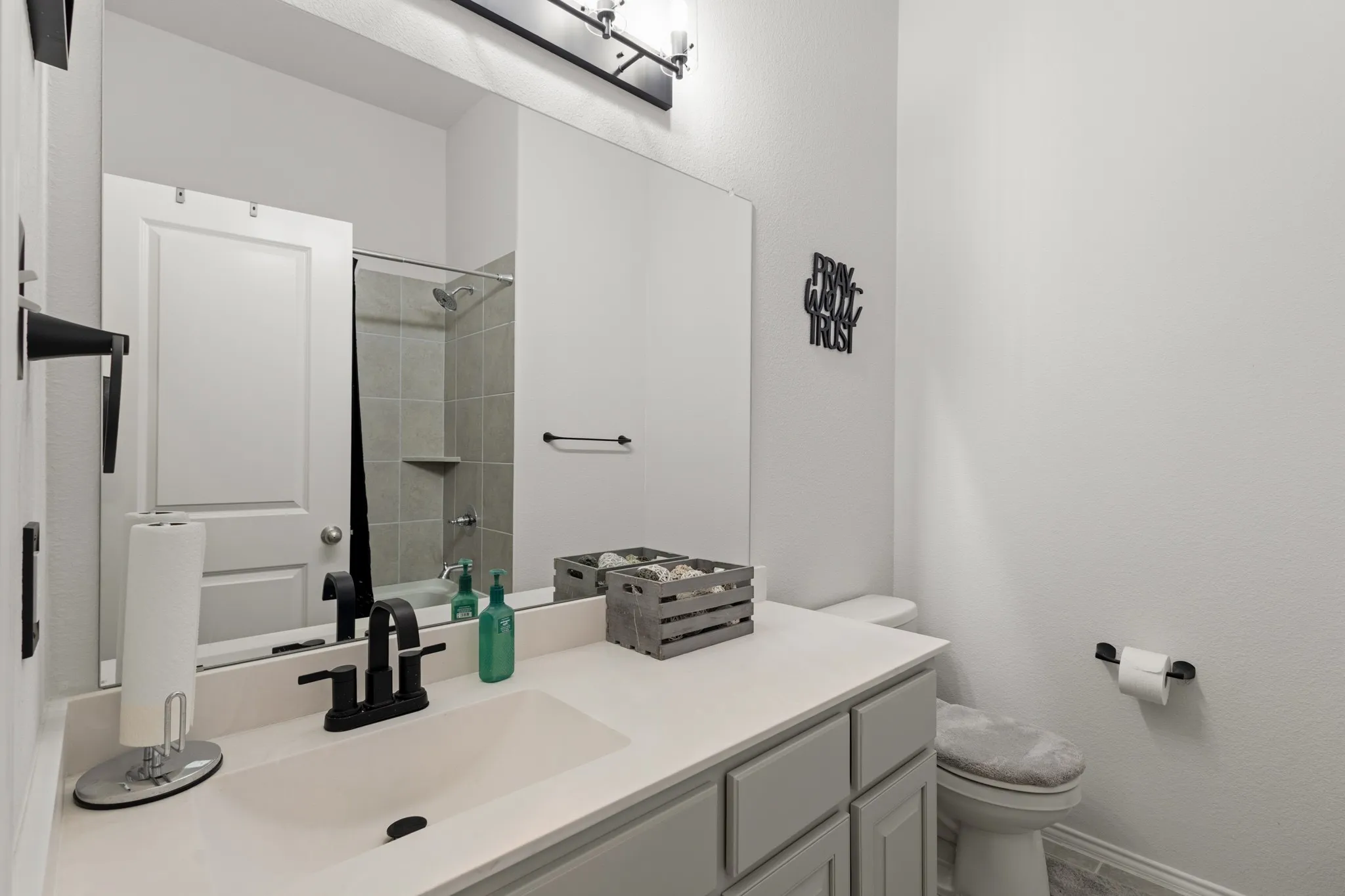 Full bath with vanity and toilet