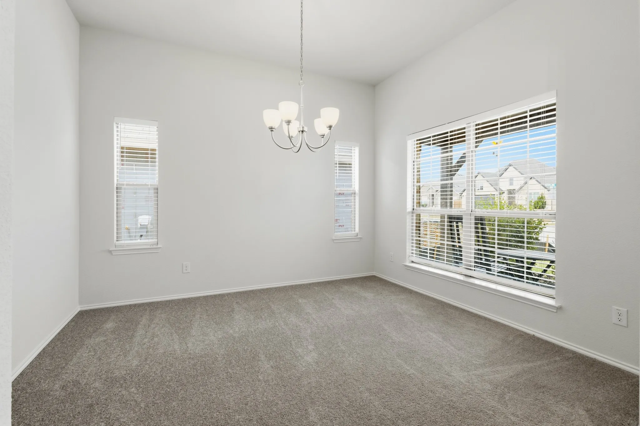 Formal dining room with large window