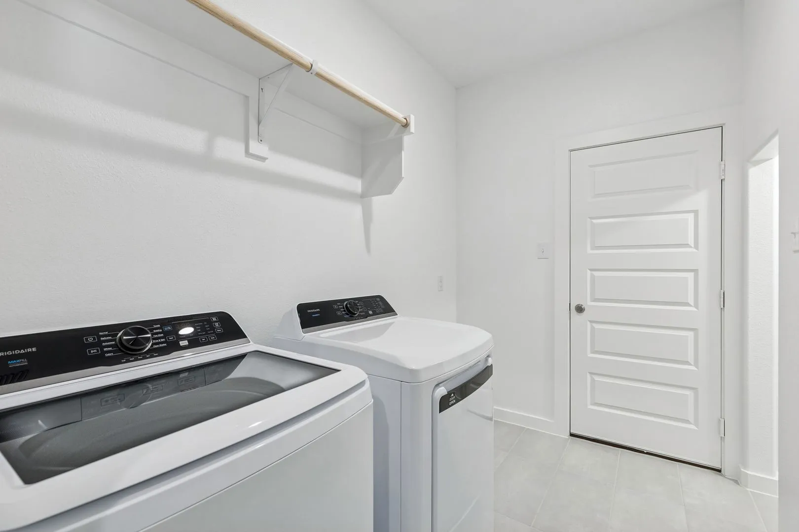 Utility Room in the Holden home plan by Trophy Signature Homes – REPRESENTATIVE PHOTO