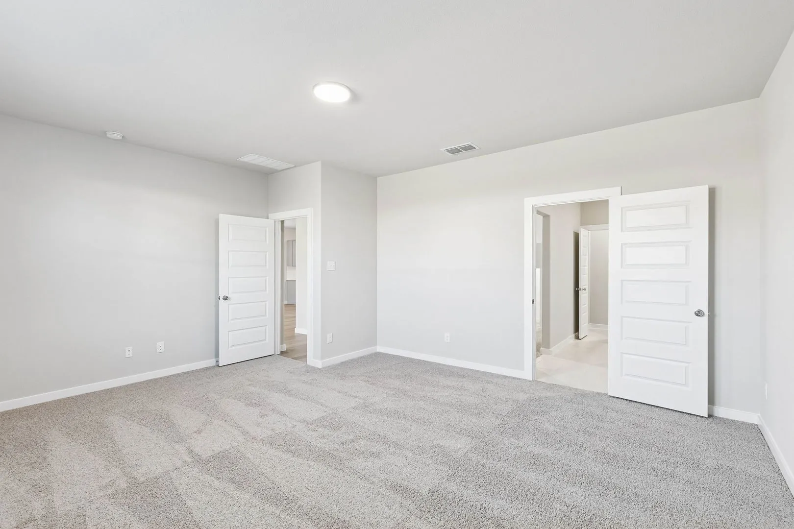 Primary Suite in the Haylee home plan by Trophy Signature Homes - REPRESENTATIVE PHOTO