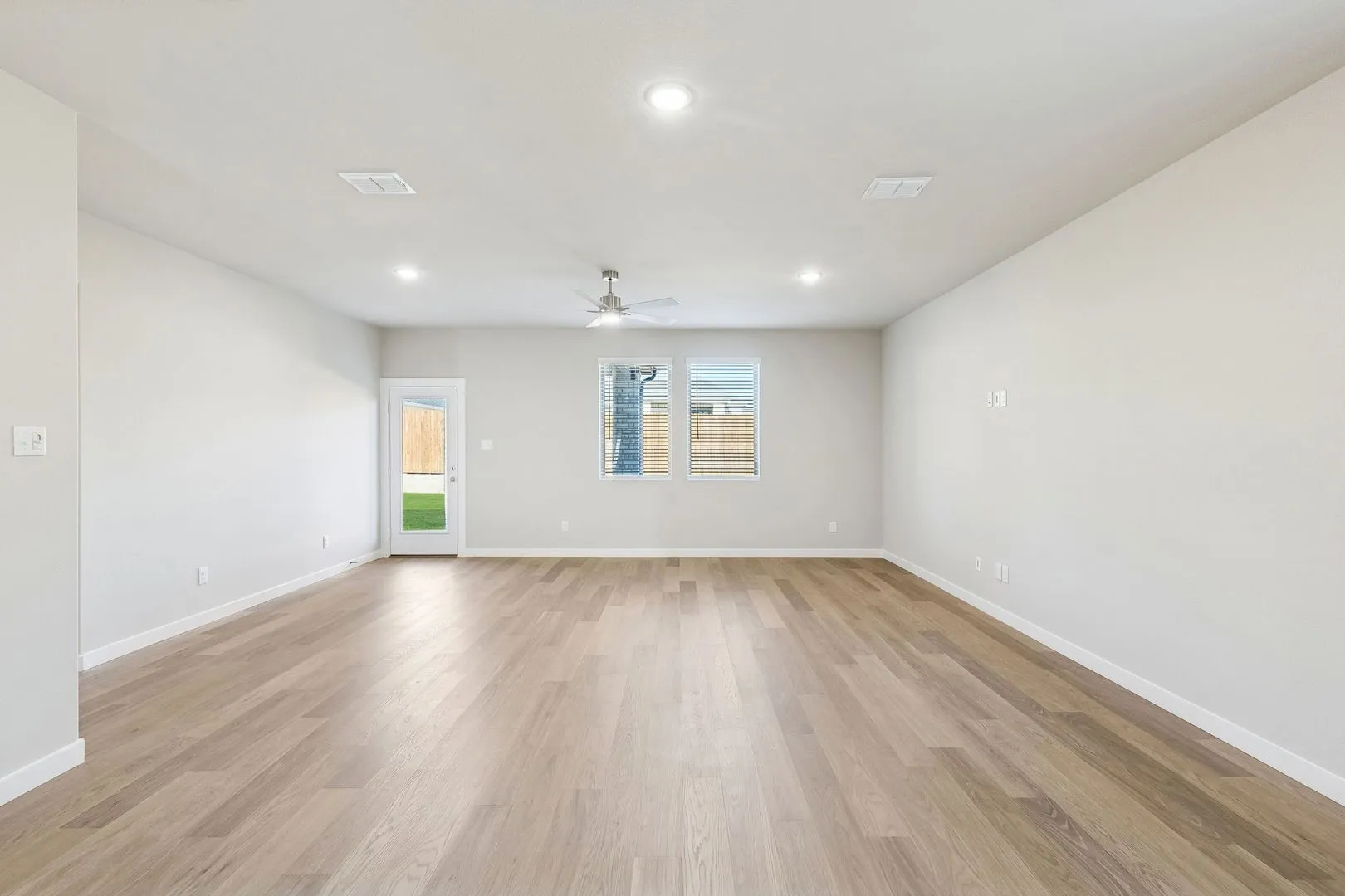 Living and Dining Room in the Haylee home plan by Trophy Signature Homes - REPRESENTATIVE PHOTO