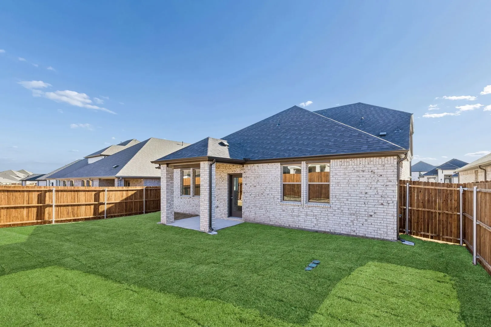 Covered Patio in the Haylee home plan by Trophy Signature Homes - REPRESENTATIVE PHOTO