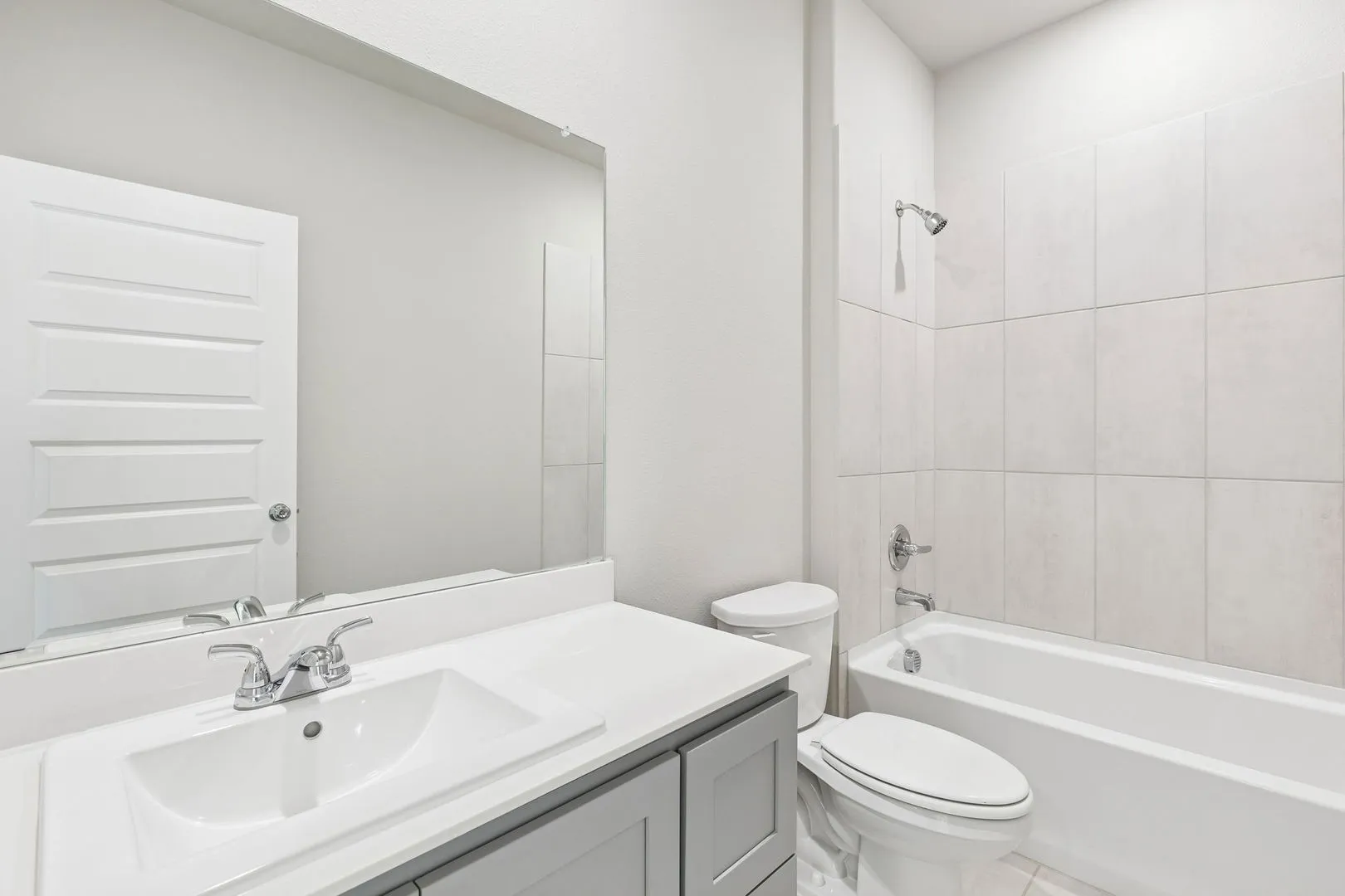 Bathroom in the Haylee home plan by Trophy Signature Homes - REPRESENTATIVE PHOTO