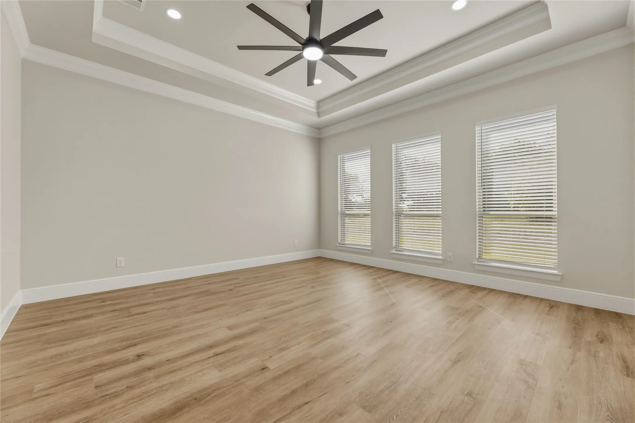 Gorgeous Master with Luxury vinyl wood plank, sculptured ceiling and double crown moulding