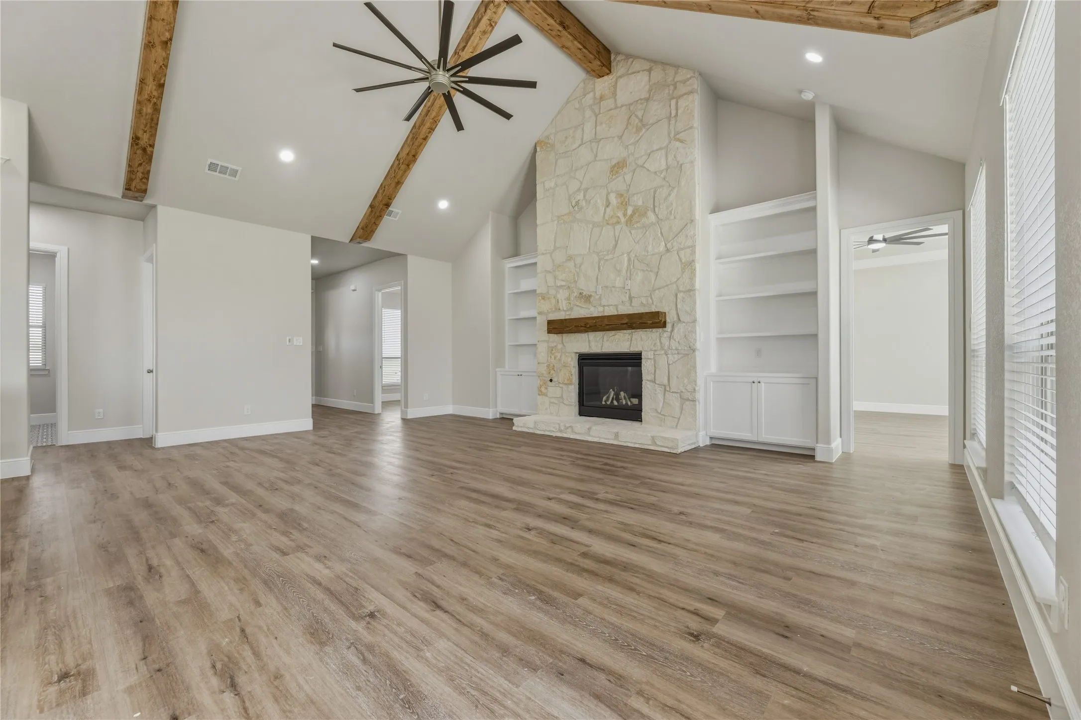 fantastic stone Gas log burning fireplace and lots of side cabinet space