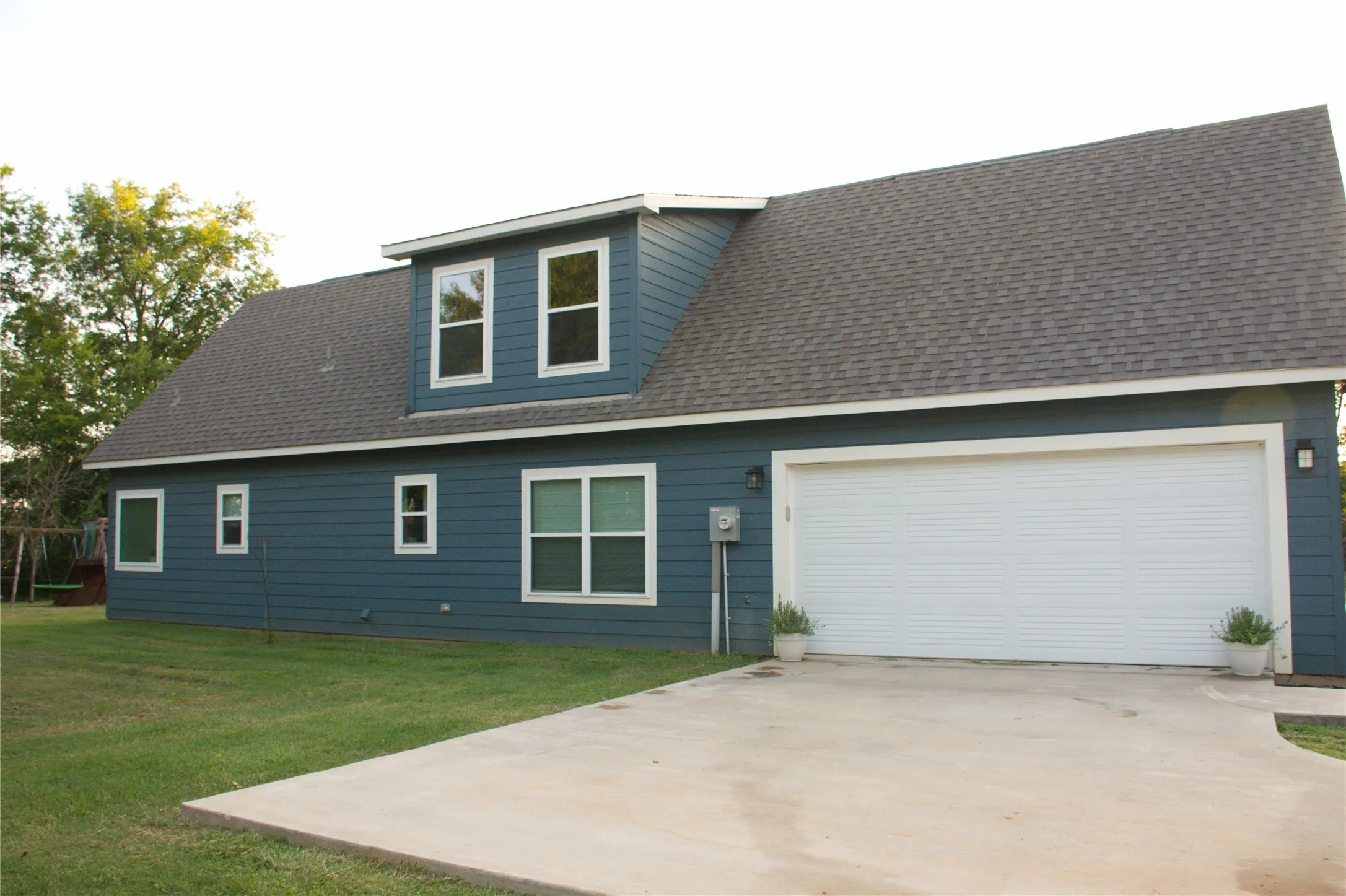 2-Car Garage entrance on side of home