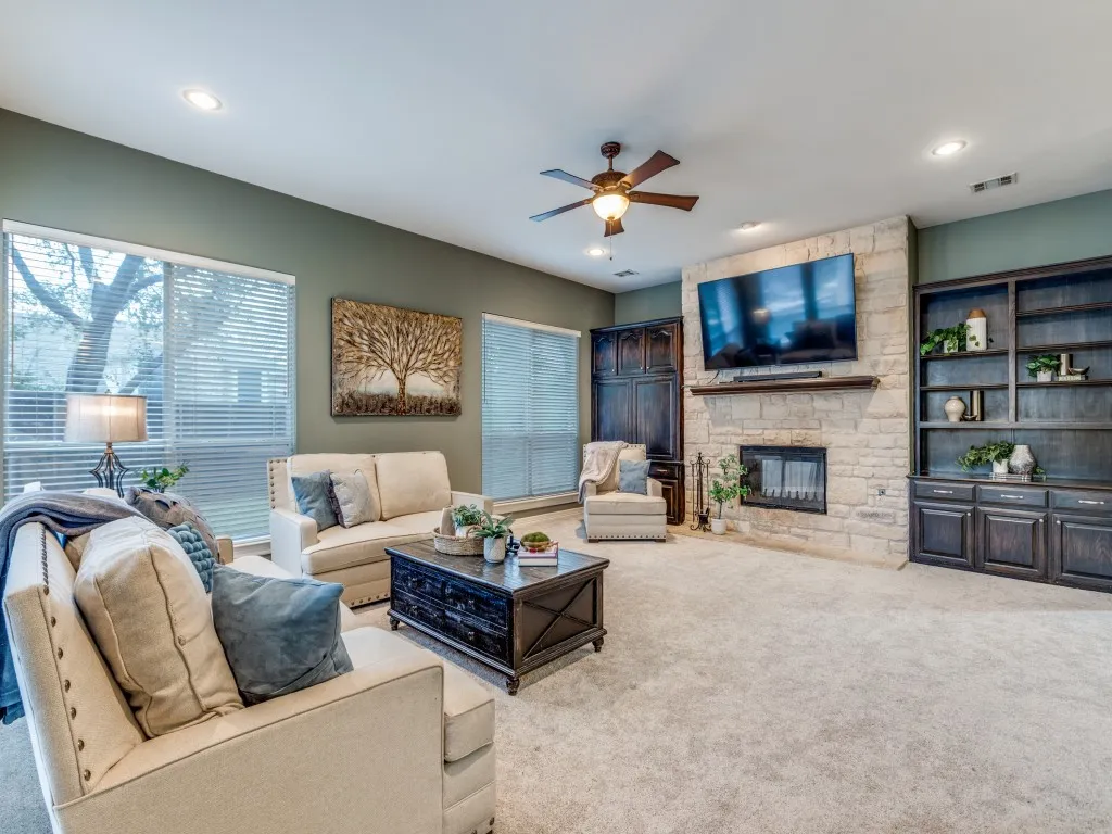 This room has been freshly painted beige, the carpet is new.