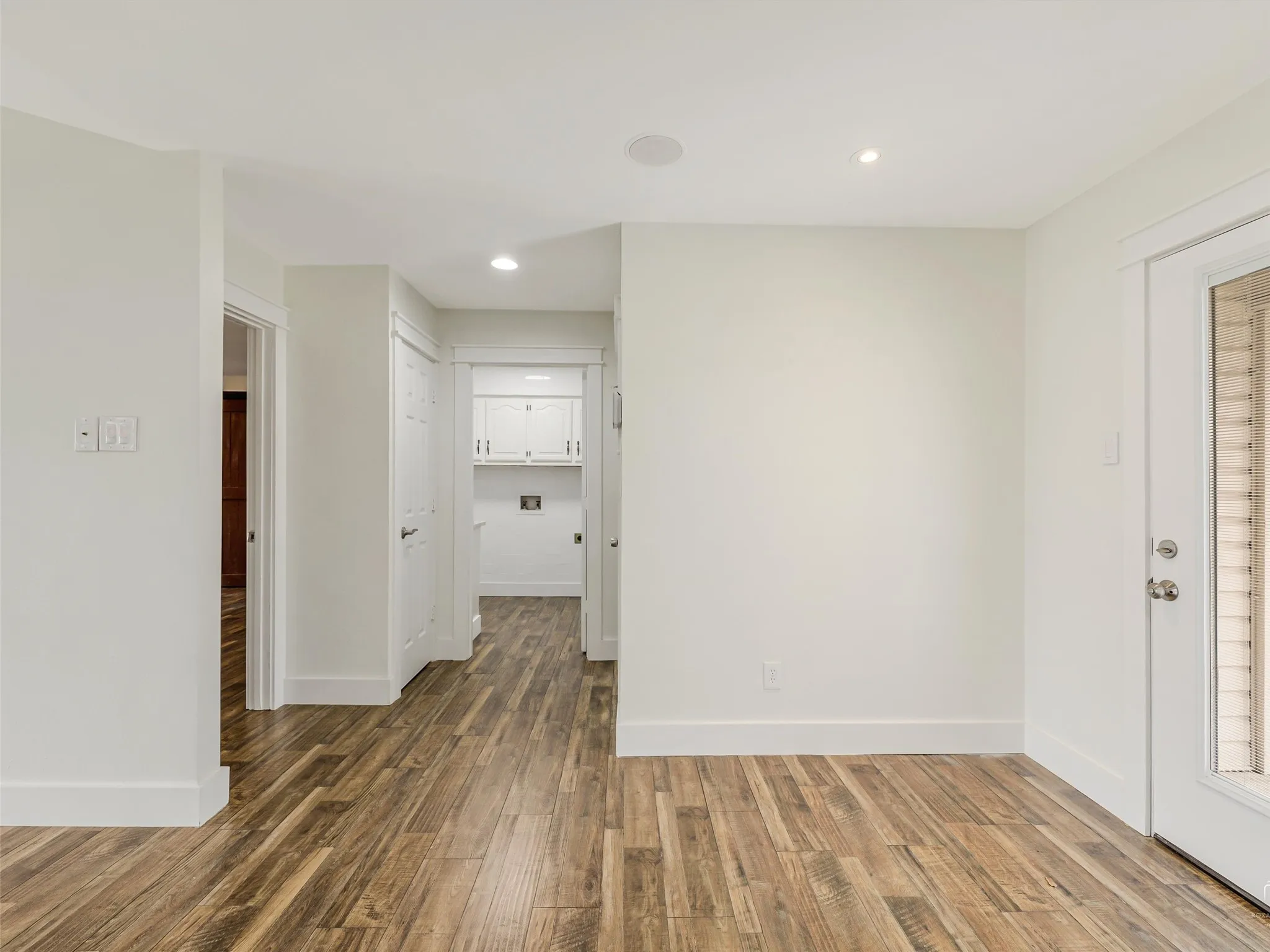 View looking into Utility Room.  Primary Bedroom is off to the left.