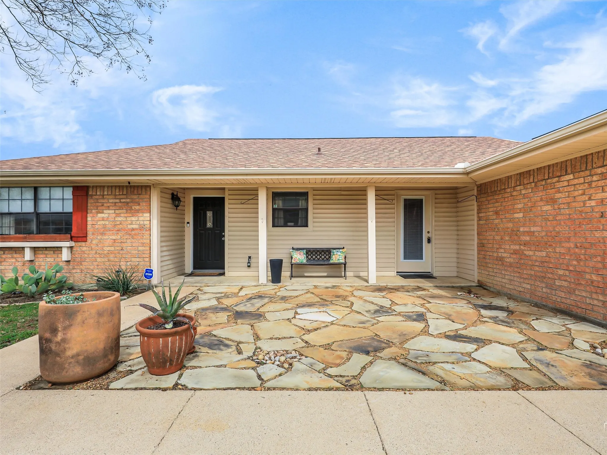 Flagstone courtyard - perfect for outdoor gatherings with friends & neighbors