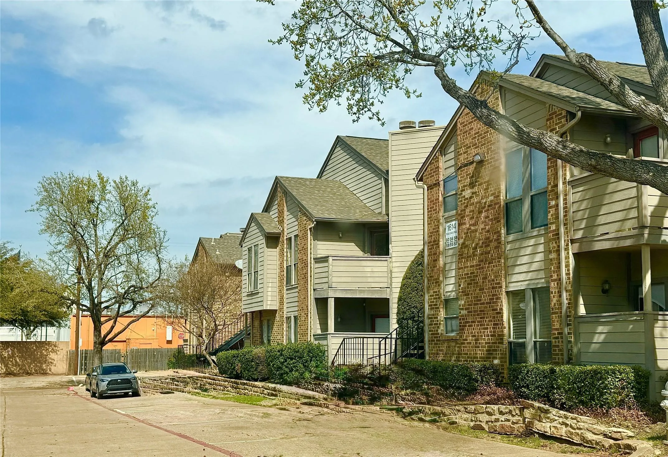 View of building exterior with a residential view